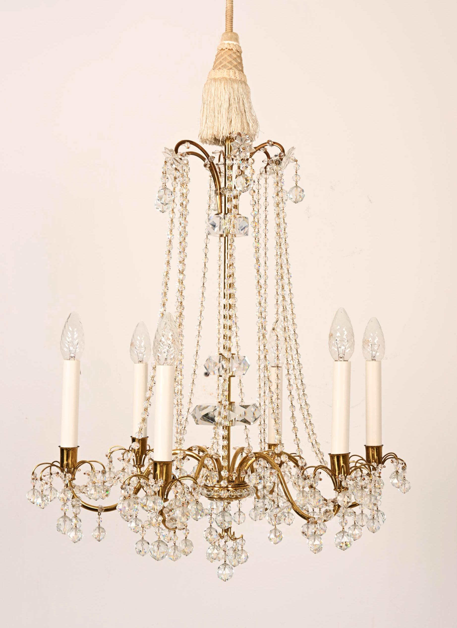 Rare brass construction with crystals element fitted with 6 E14 sockets. Manufactured by J.L. Lobmeyr in Vienna in the late 1960s.
