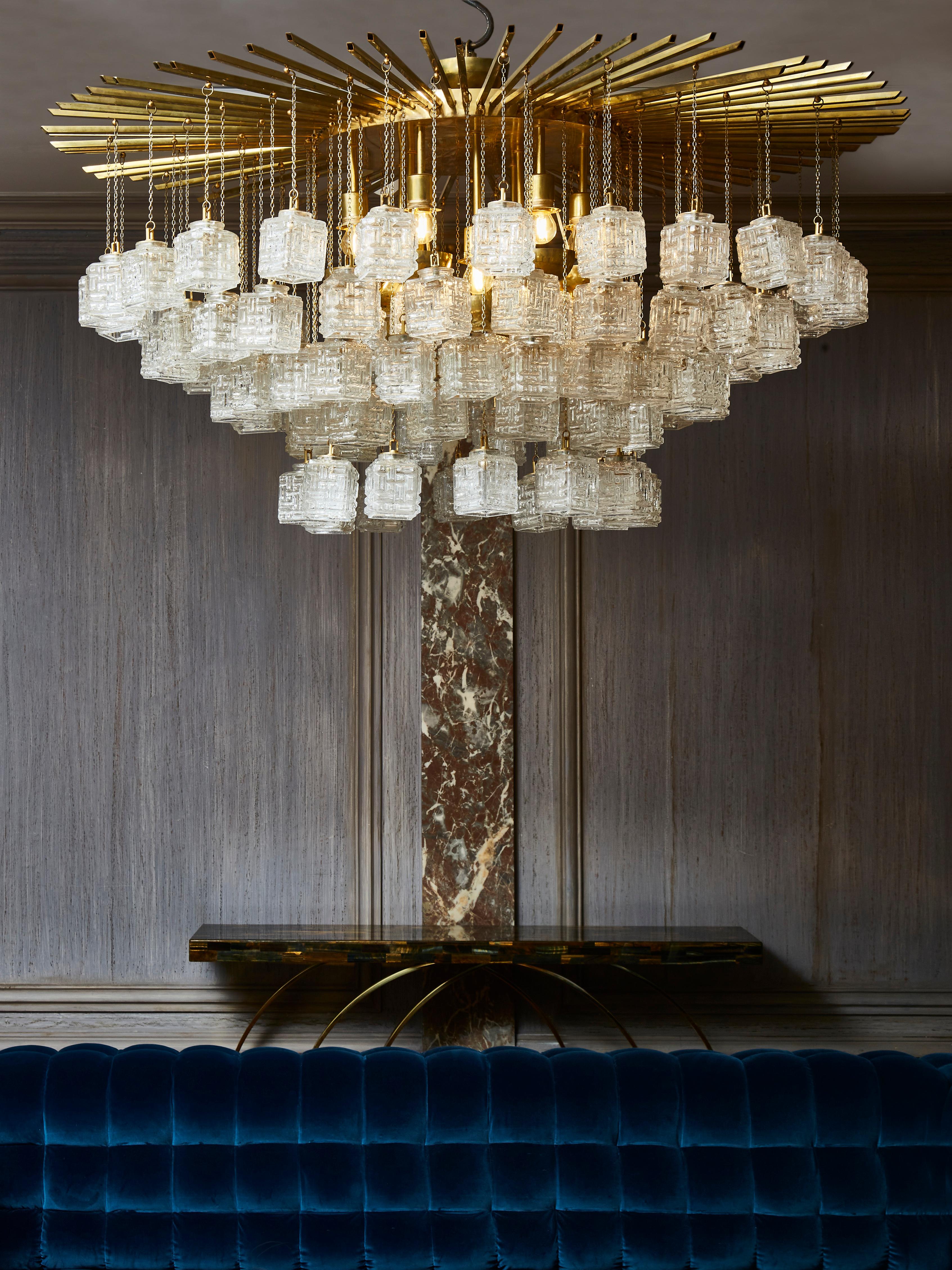 Superb ceiling in brass with cubic and sculpted Murano glasses. 
Creation by Studio Glustin.