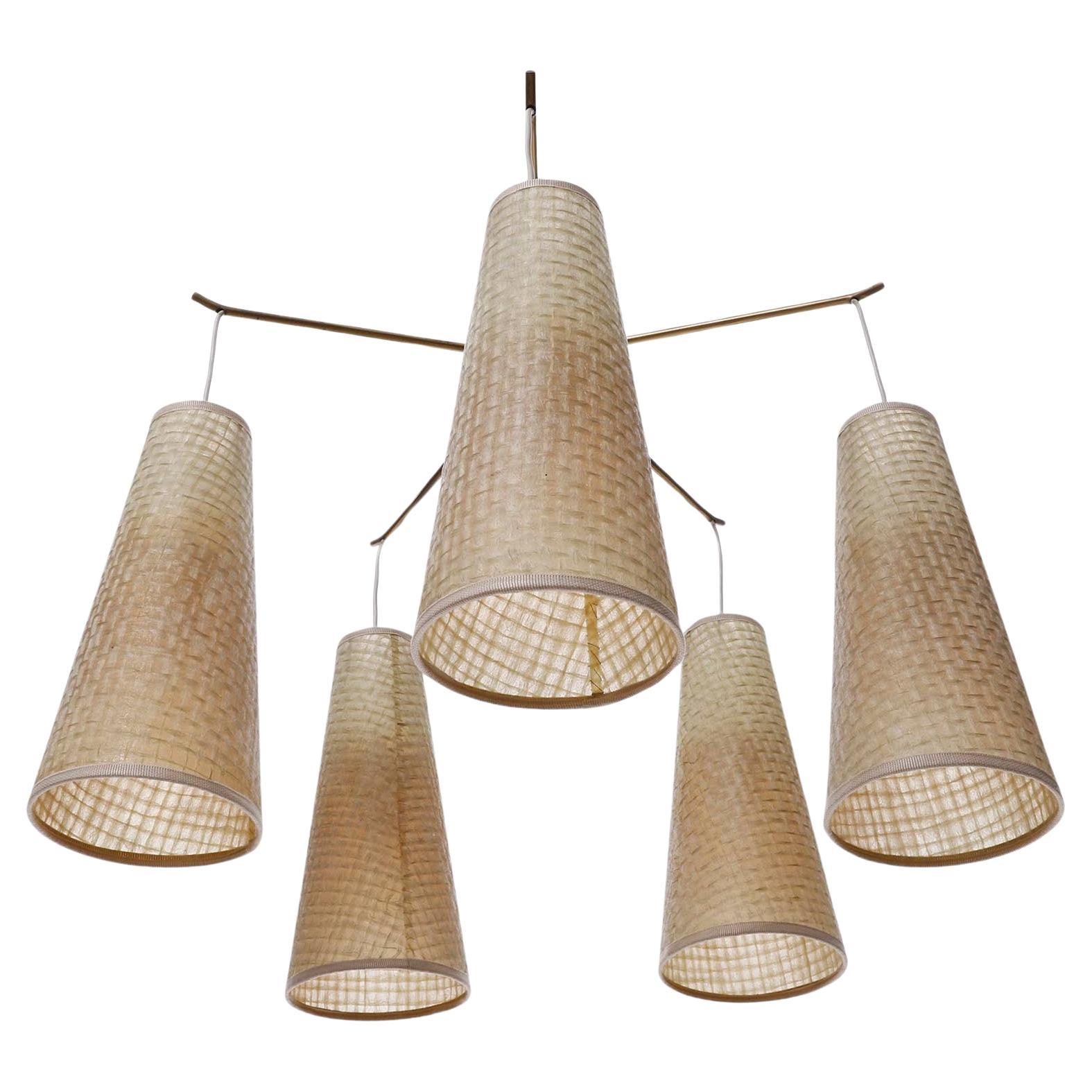 A brass ceiling or flush mount light model 'POLKA' no. 5180/5 with five arms and braided lamp shades by J.T. Kalmar, Vienna, Austria, manufactured in midcentury, ca. 1960 (late 1950s or early 1960s).
The light is documented in the Kalmar catalogue