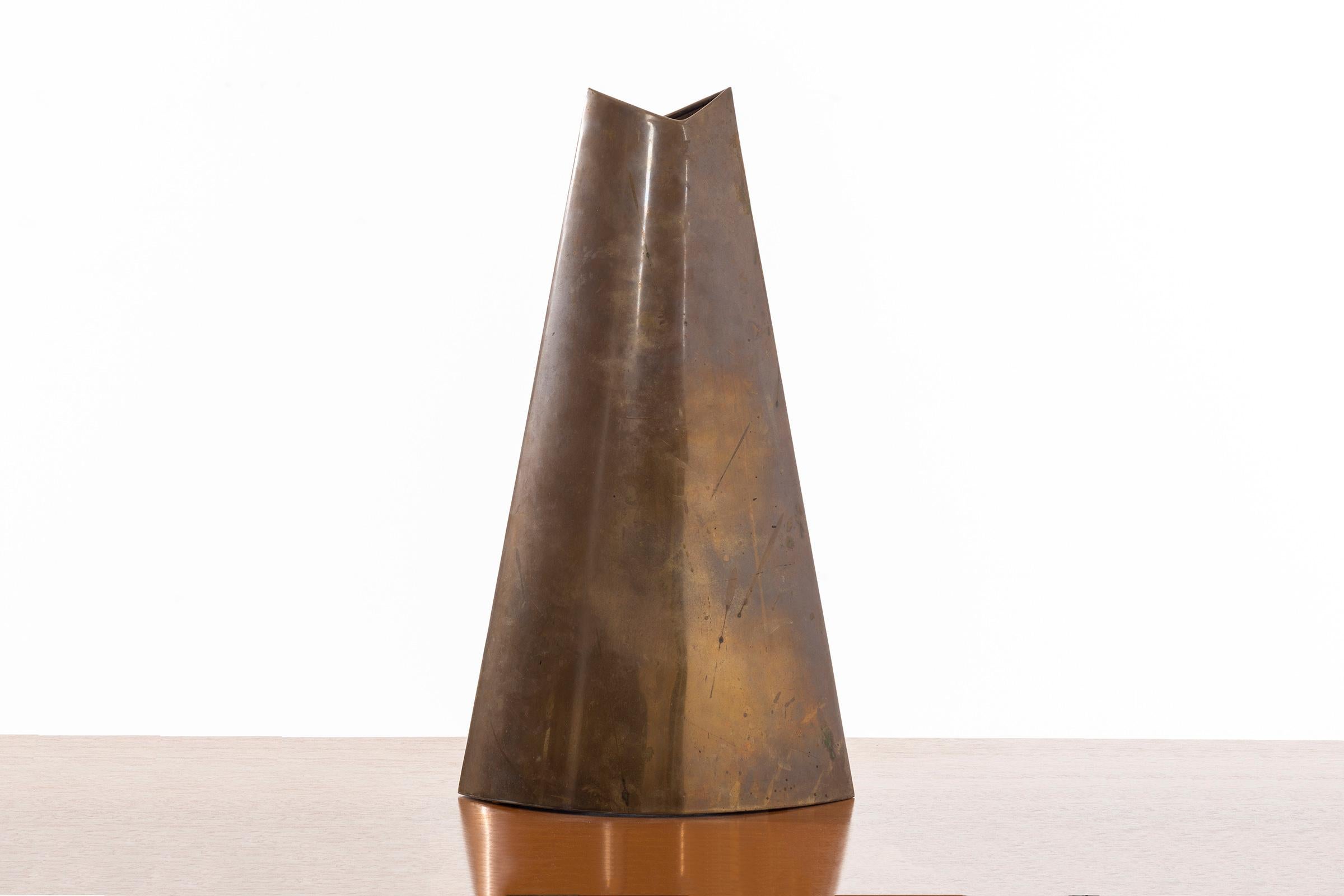 Brass center piece vase, signes James Johnston for Balos underside.
