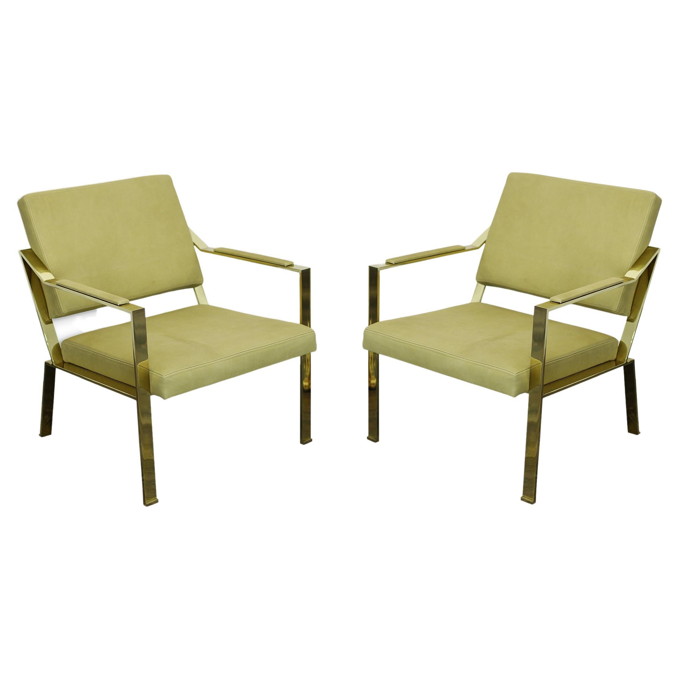 Very elegant pair of Gilt Iron chairs covered in light green leather. For Sale