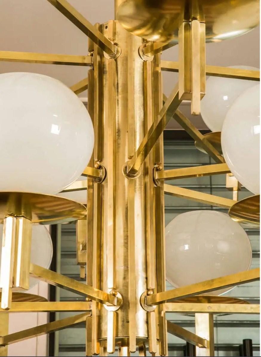 Modern Brass Chandelier at cost price. For Sale