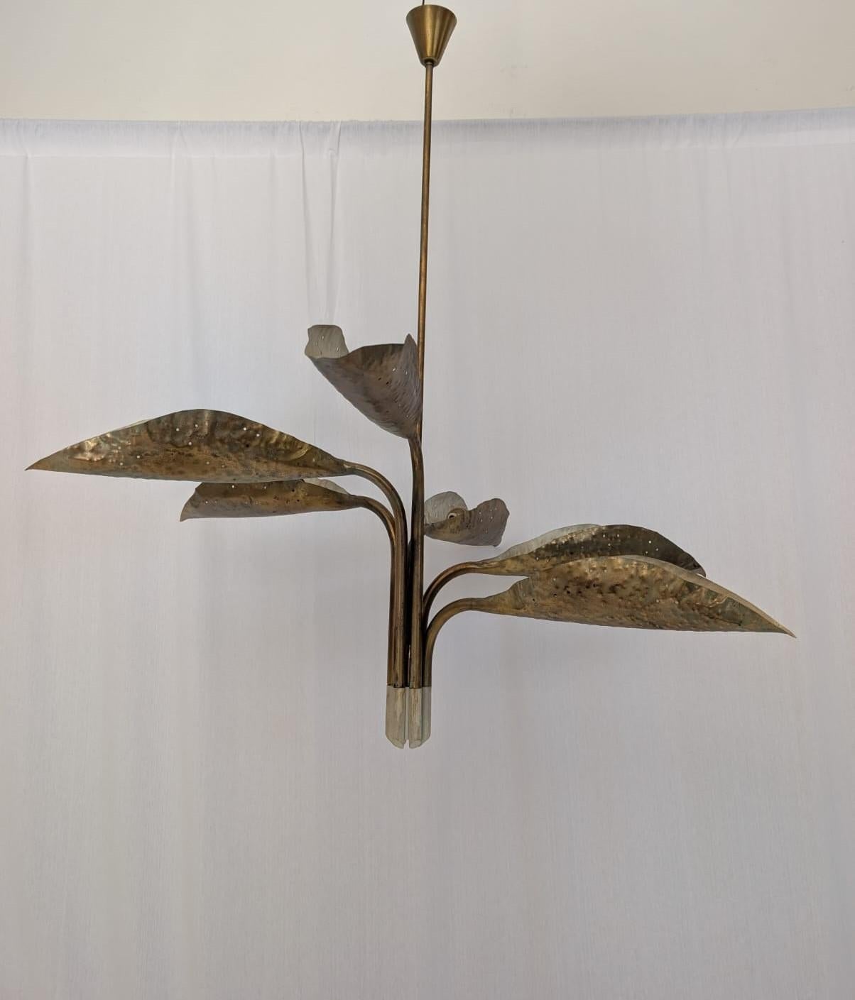 Elevate your space with this rare and elegant ceiling light, the iconic chandelier model 12369, designed by Angelo Lelii for the renowned Italian lighting firm Arredoluce in 1951. A true testament to mid-century design and impeccable craftsmanship,