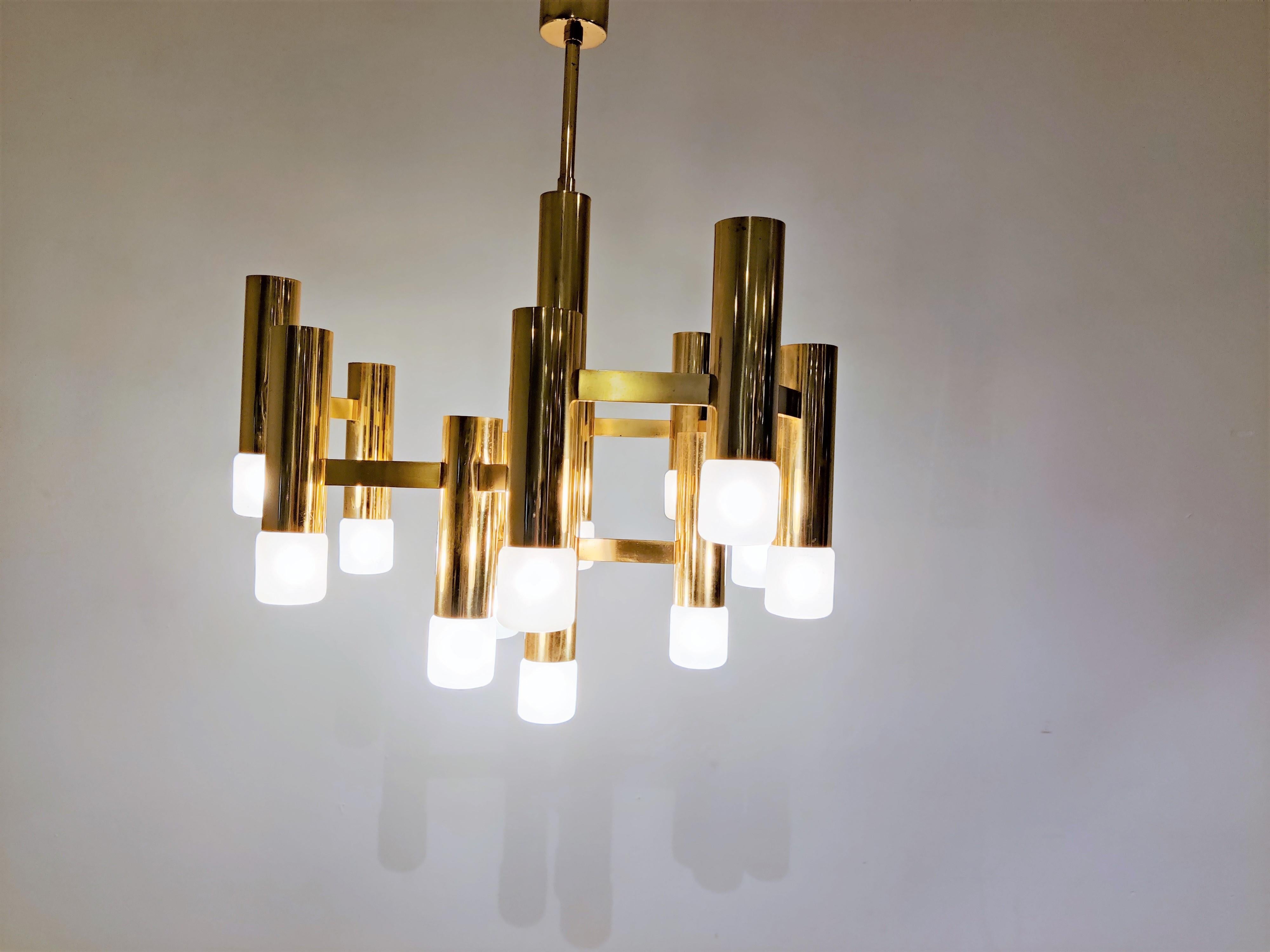 Tubular brass Gaetano Sciolari chandelier with 13 lightpoints.

Produced by Boulanger SA in Belgium

The chandelier is in very good condition and in full working order.

Tested and ready for use, chandelier will work all around the