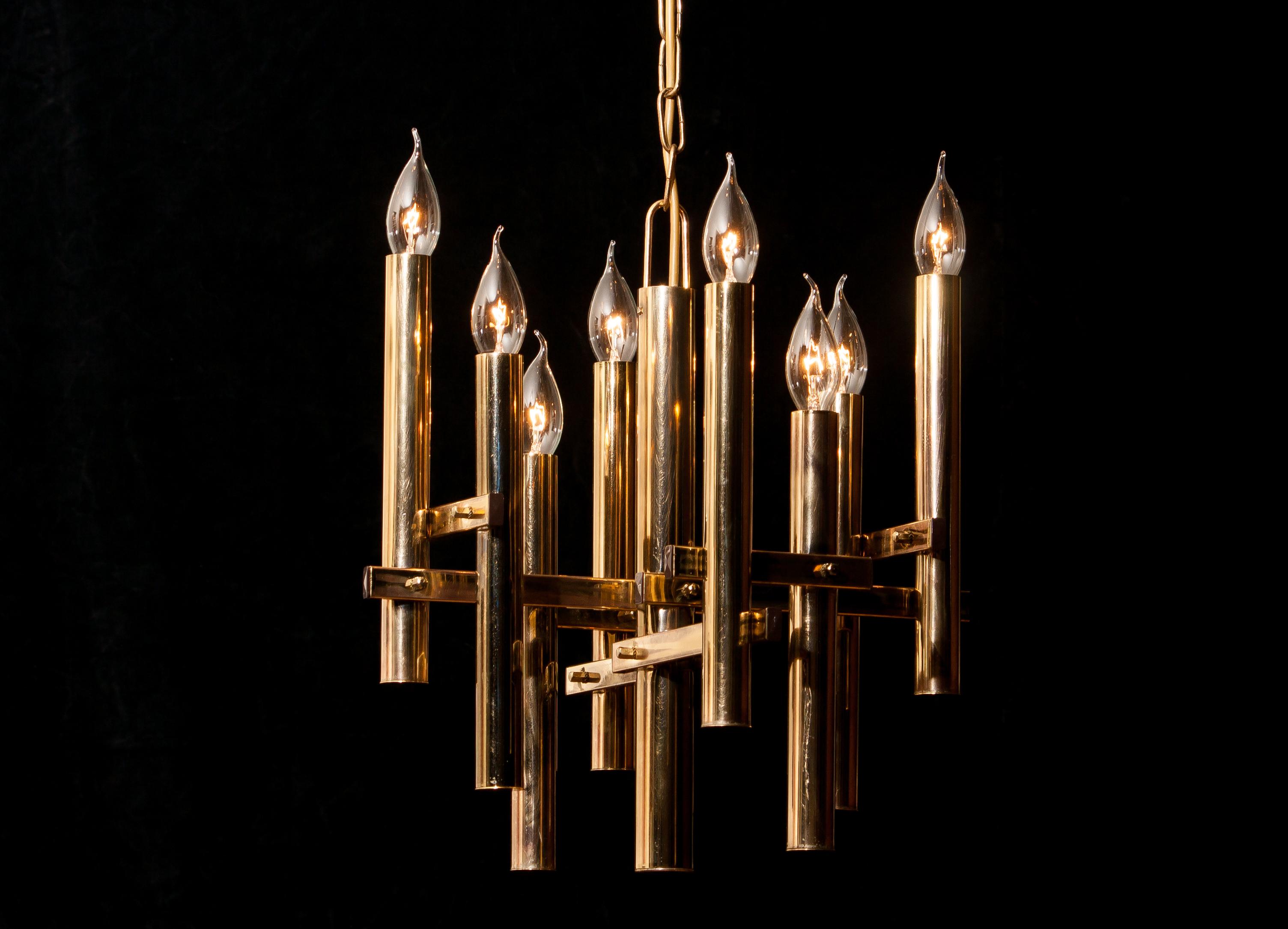 Beautiful brass pendant by Gaetano Sciolari, Italy.
This wonderful lamp has eight fittings.
The height is adjustable.
It is in excellent condition.
Period 1960s.
Dimensions: H 93 cm, ø 40 cm.