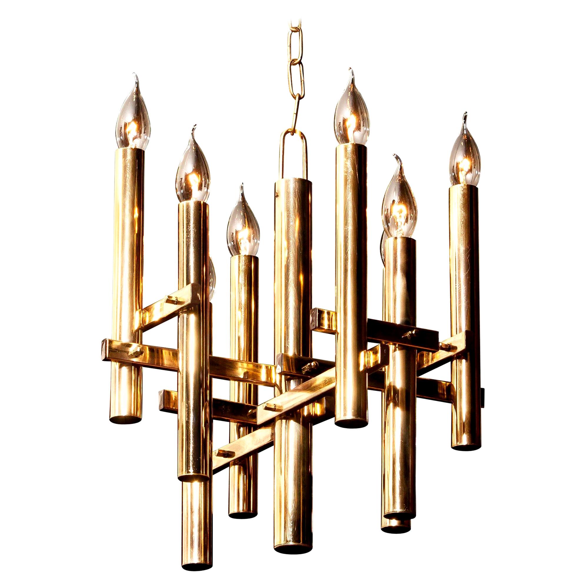 Beautiful brass pendant by Gaetano Sciolari, Italy.
This wonderful lamp has eight fittings.
The height is adjustable.
It is in excellent condition.
Period, 1960s.
Dimensions: H 93 cm, ø 40 cm.