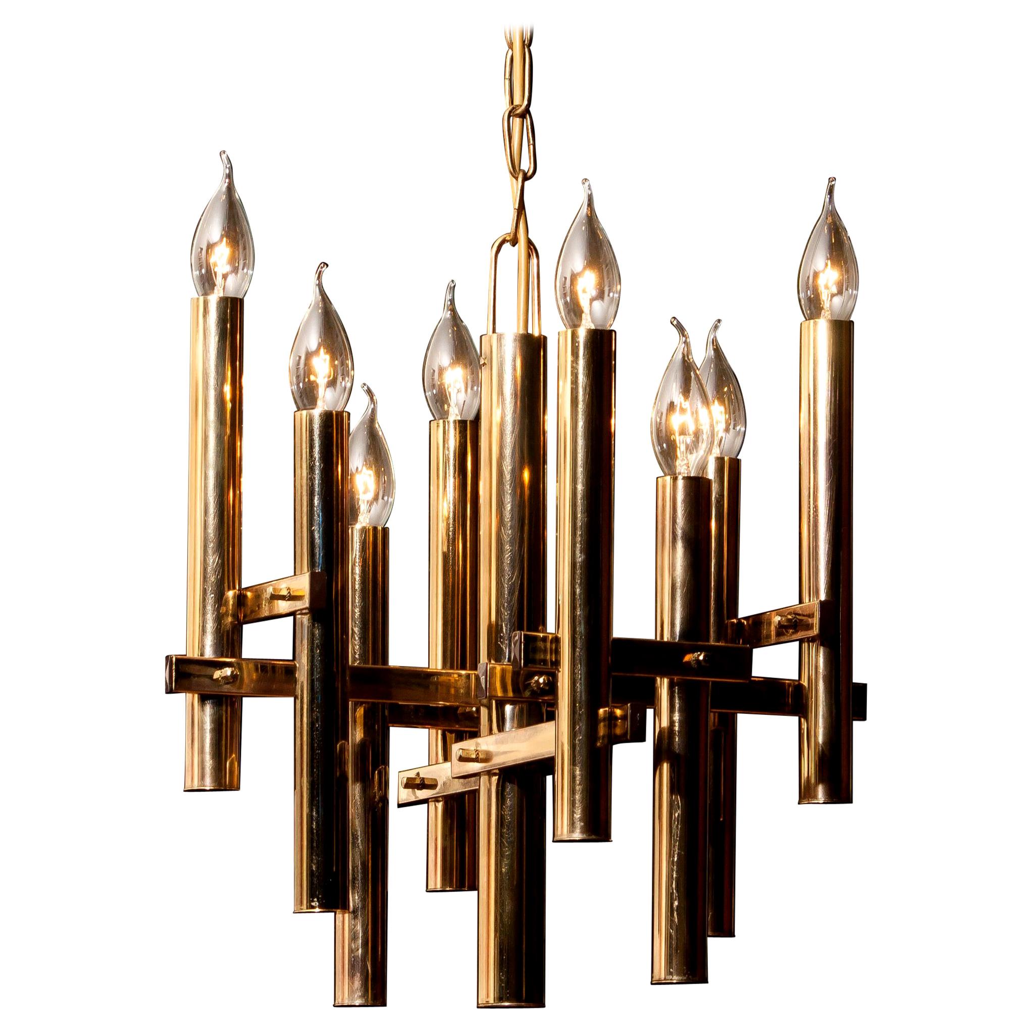 Beautiful brass pendant by Gaetano Sciolari, Italy.
This wonderful lamp has eight fittings.
The height is adjustable.
It is in excellent condition.
Period, 1960s.
Dimensions: H 93 cm, ø 40 cm.