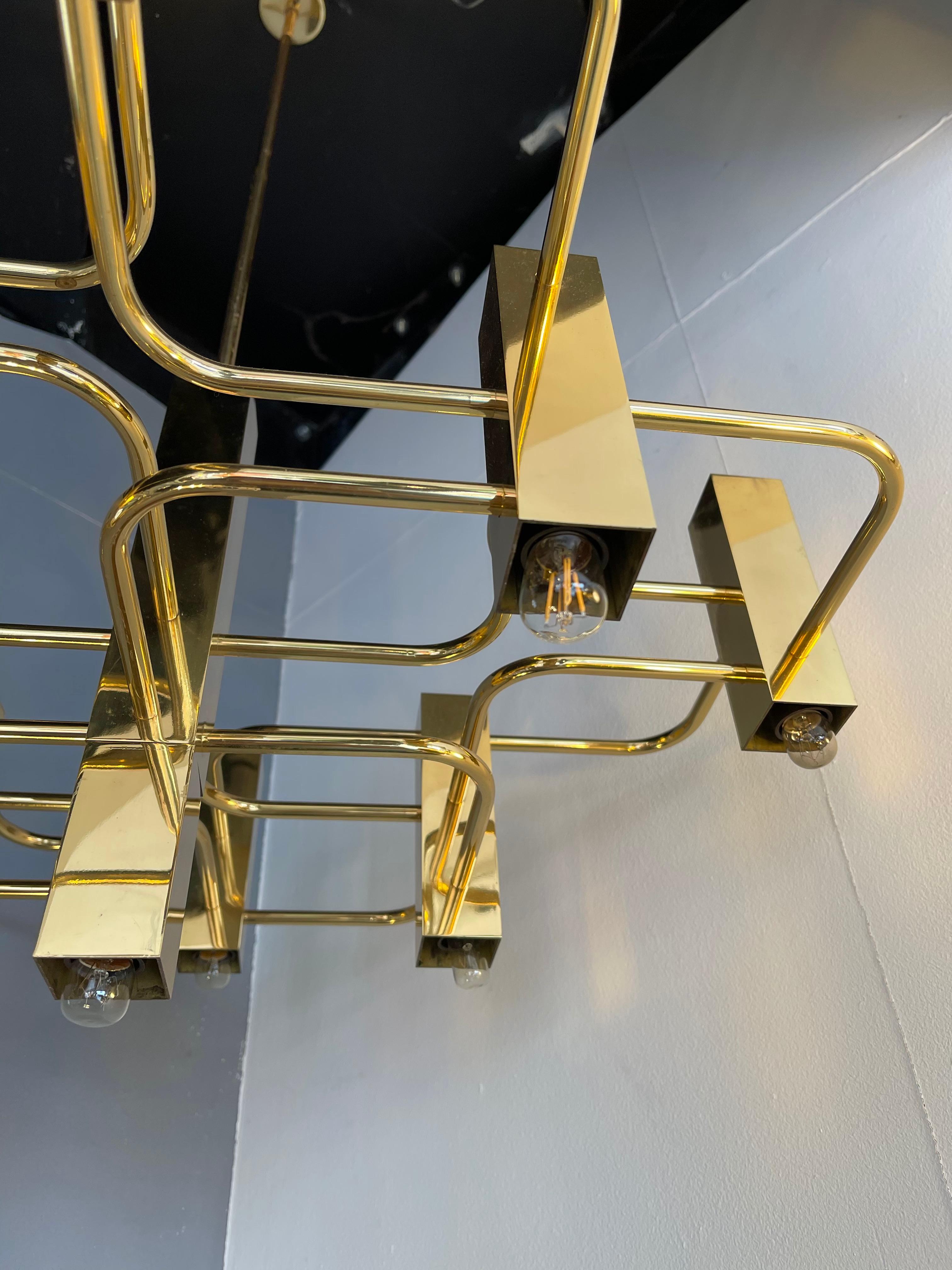 Brass chandelier pendant light by Gaetano Sciolari for the editor Boulanger. Original stamp from the manufacture. Famous design like Reggiani, Stilux, Targetti, Willy Rizzo for Lumica, Romeo Rega.