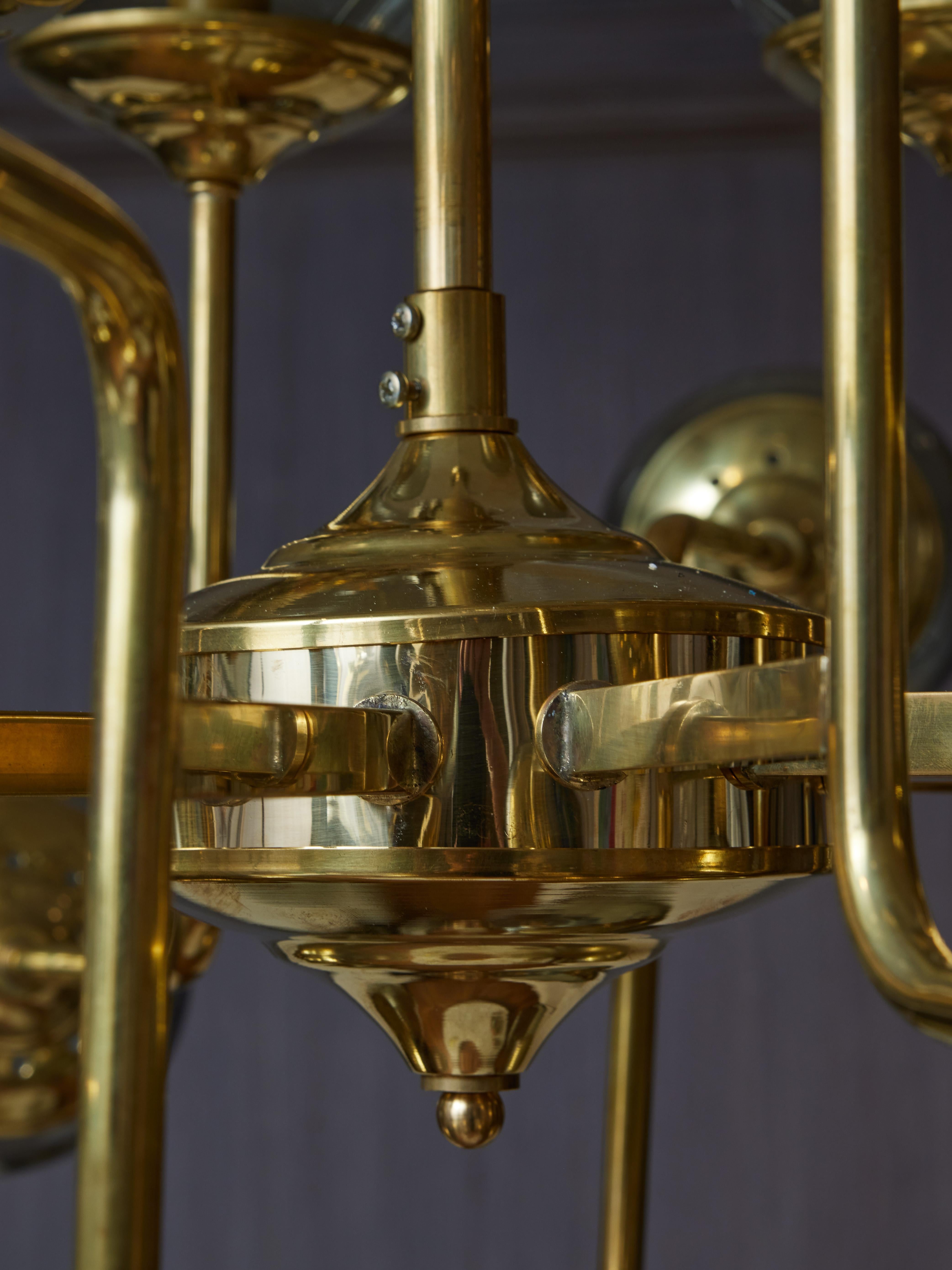 Italian Brass chandelier by Studio Glustin For Sale