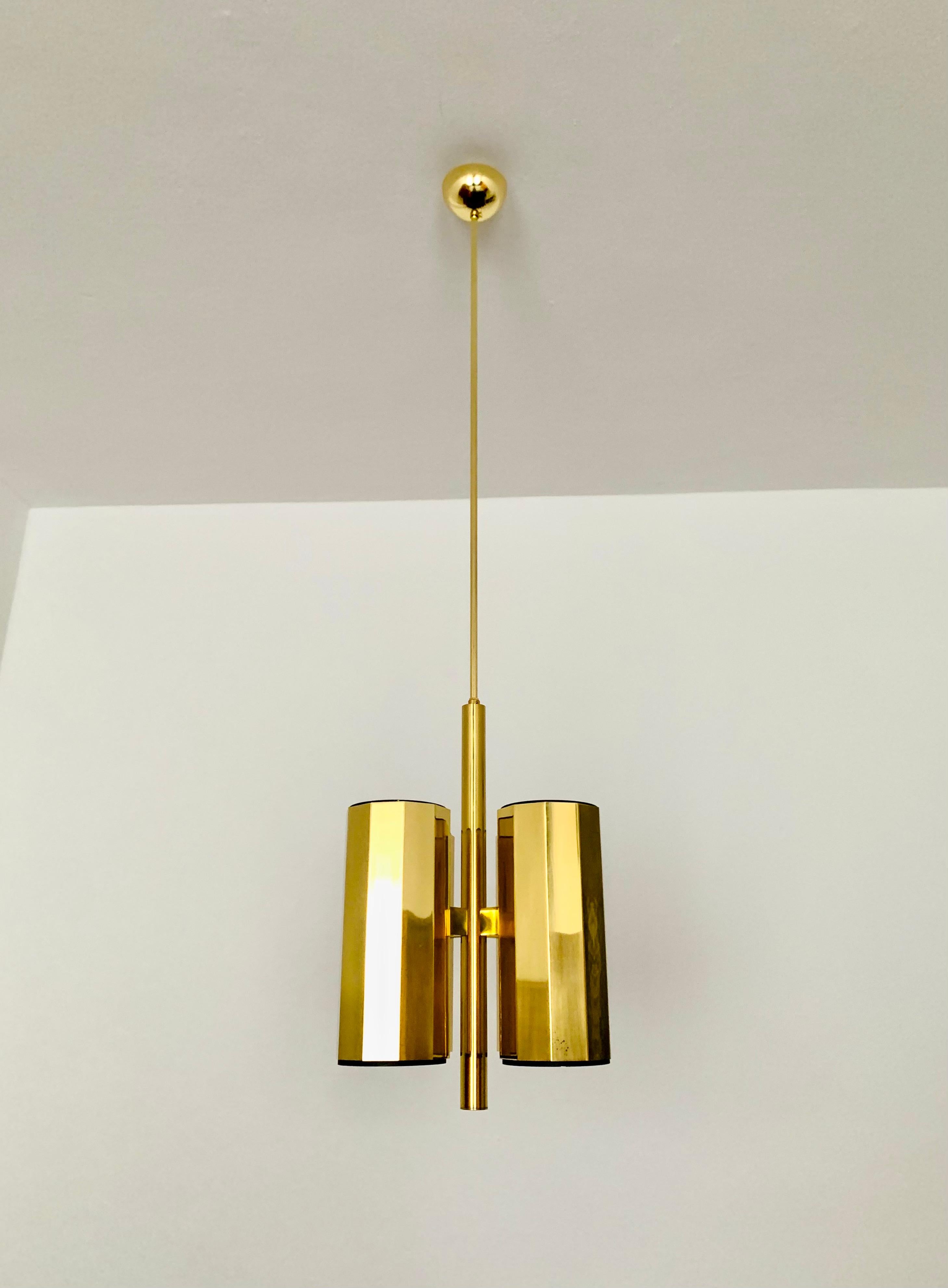 Impressively beautiful brass chandelier from the 1960s.
High-quality workmanship and an absolute highlight for every room.
A beautiful lighting mood is created.

Condition:

Very good vintage condition with slight signs of wear consistent with