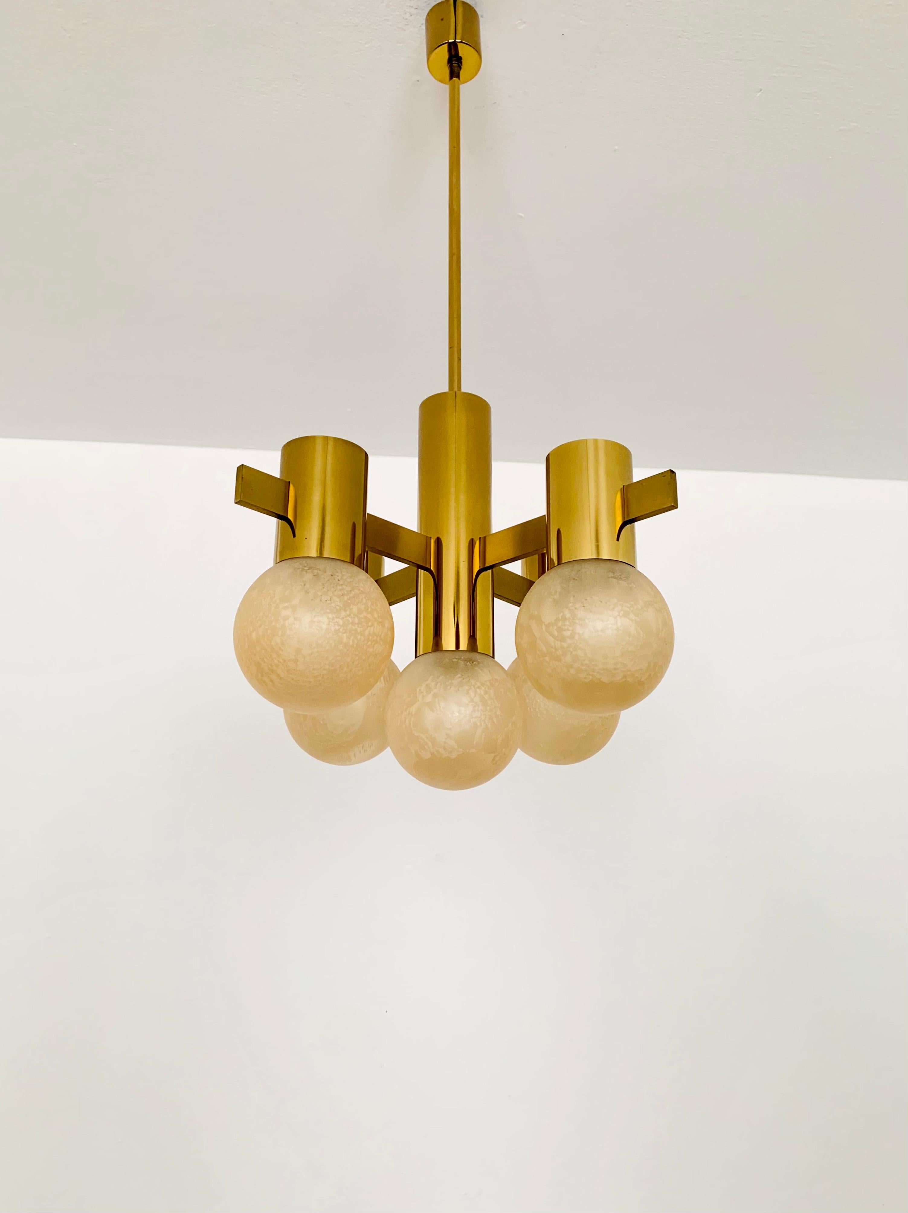 Wonderful and rare Sputnik chandelier from the 1960s.
The structured lampshades spread a sparkling light.
The lamp has a very high quality finish.
Very contemporary design with a fantastic look.

Condition:

Very good vintage condition with slight