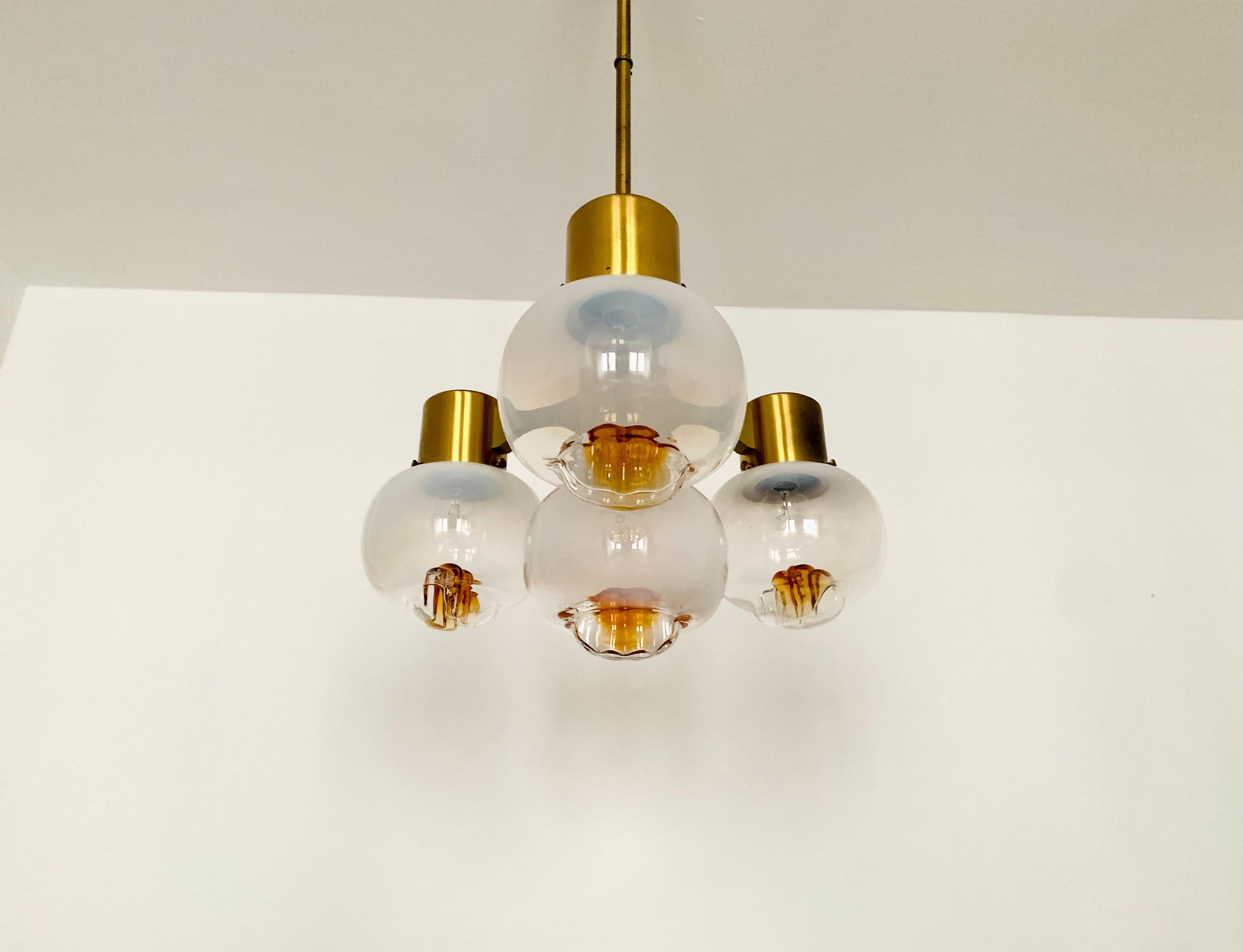 Mid-Century Modern Brass chandelier For Sale