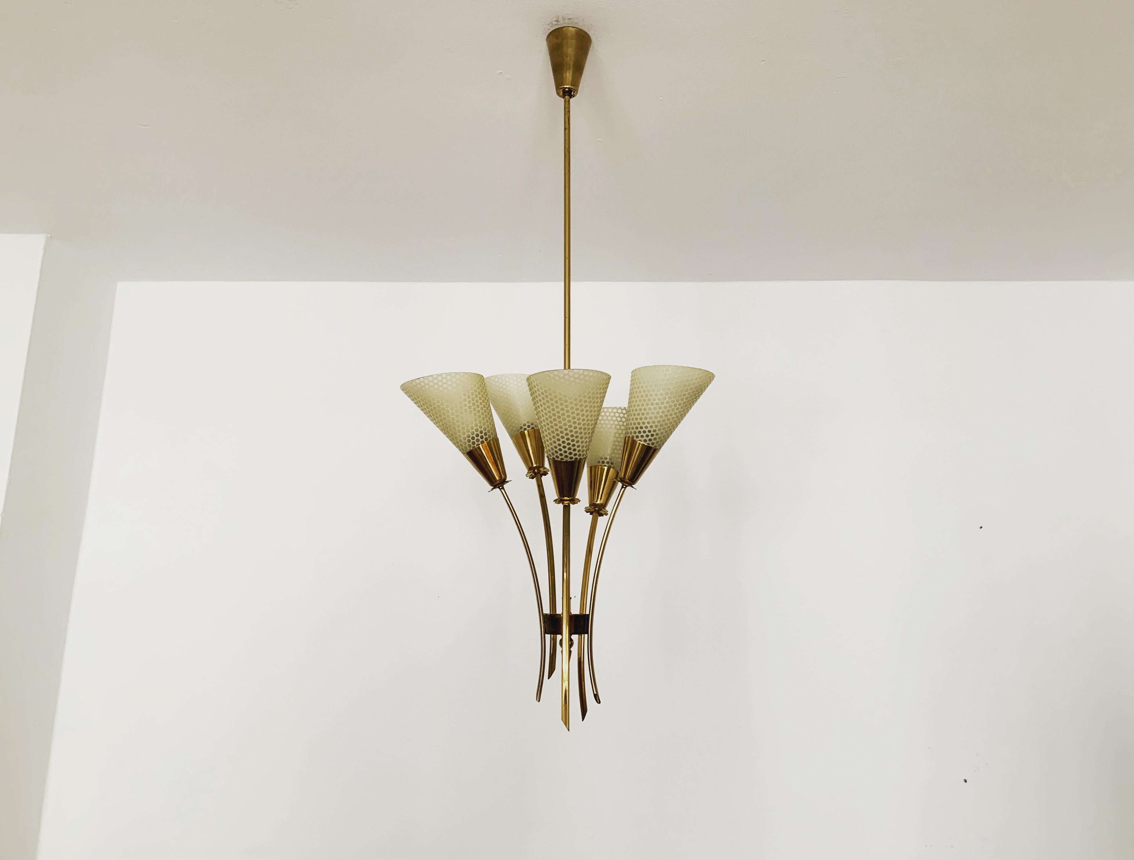 Mid-Century Modern Brass chandelier For Sale