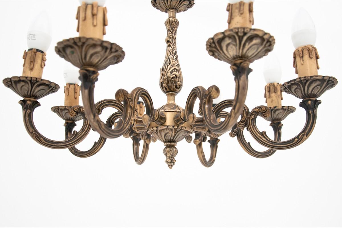 Brass chandelier from the mid-20th century. Year: circa 1950. Material: brass.