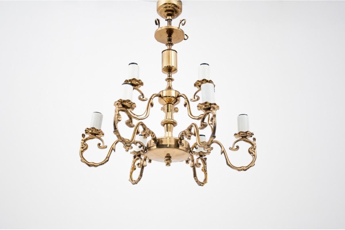 Brass chandelier, Poland, 1950s
Dimensions: height 55 cm / diameter 50 cm.

 
