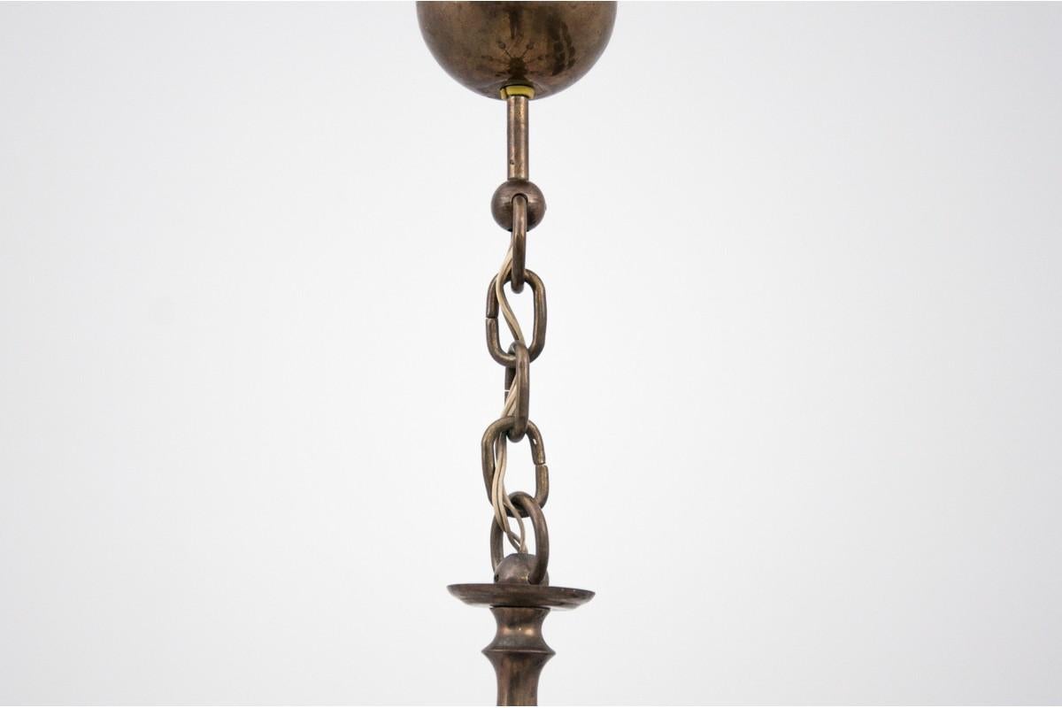 Brass chandelier, Poland, 1950s
Dimensions: height 60 cm / diameter 47.


 