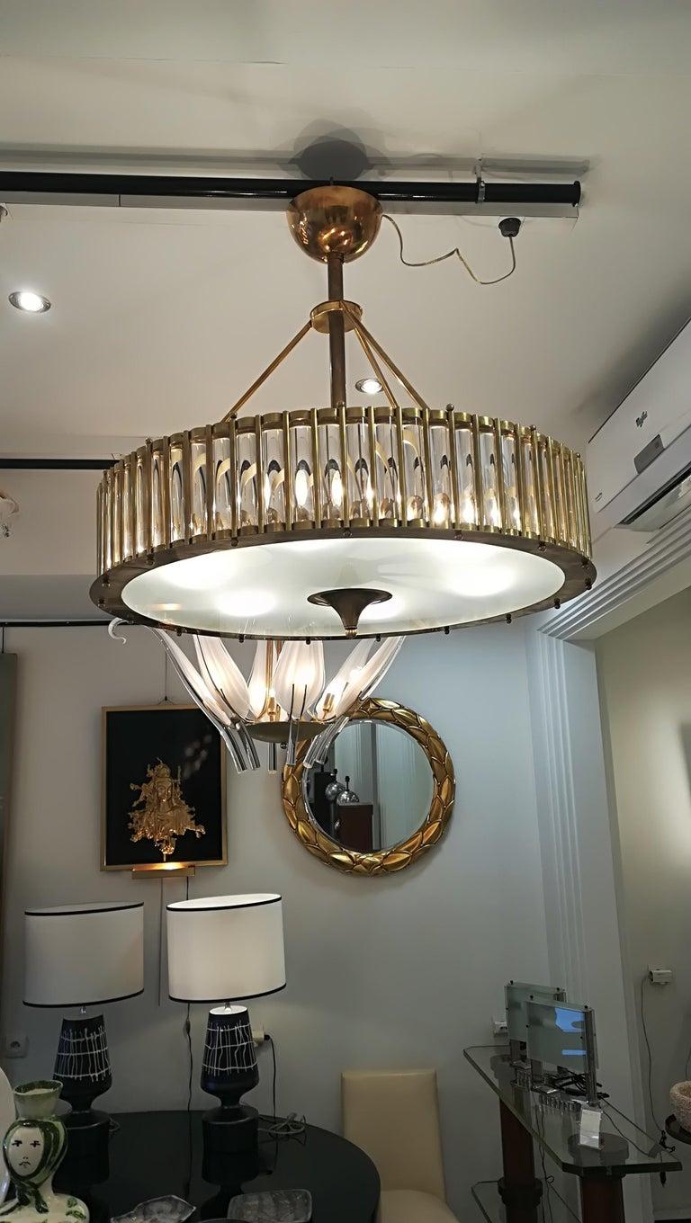 Brass chandelier with crystal inserts all around, 6 bulbs.