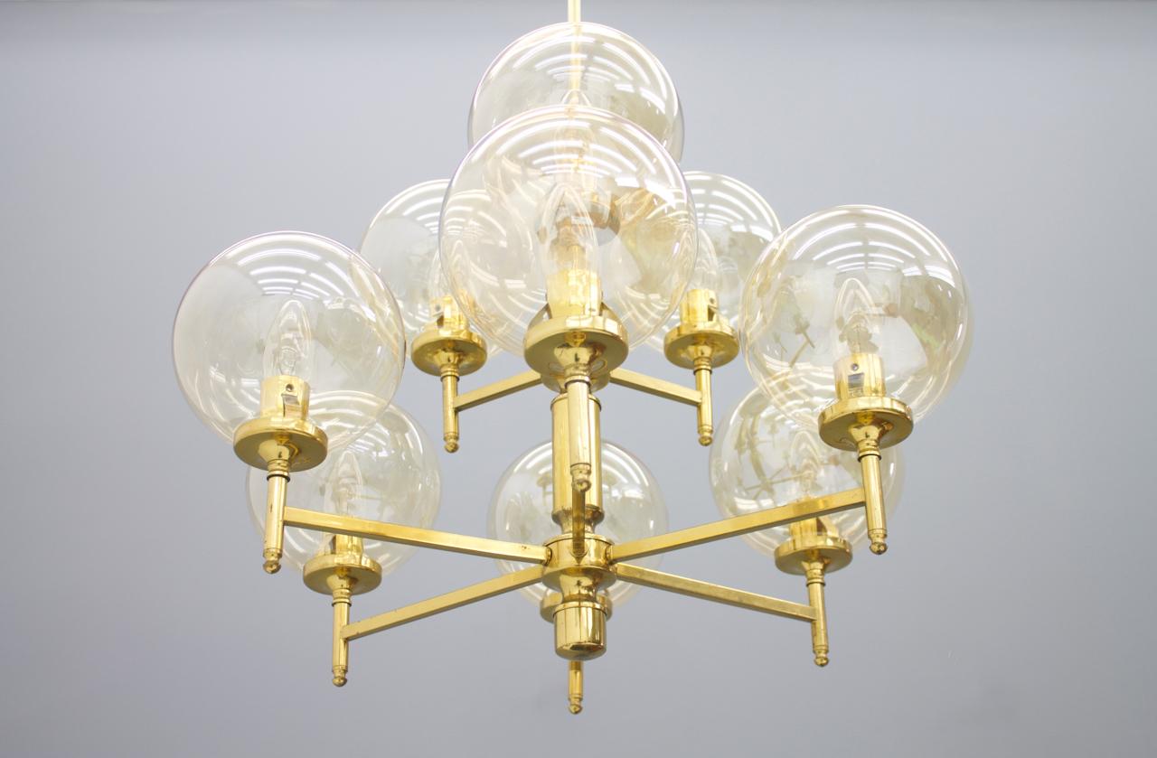 brass chandelier with glass globes
