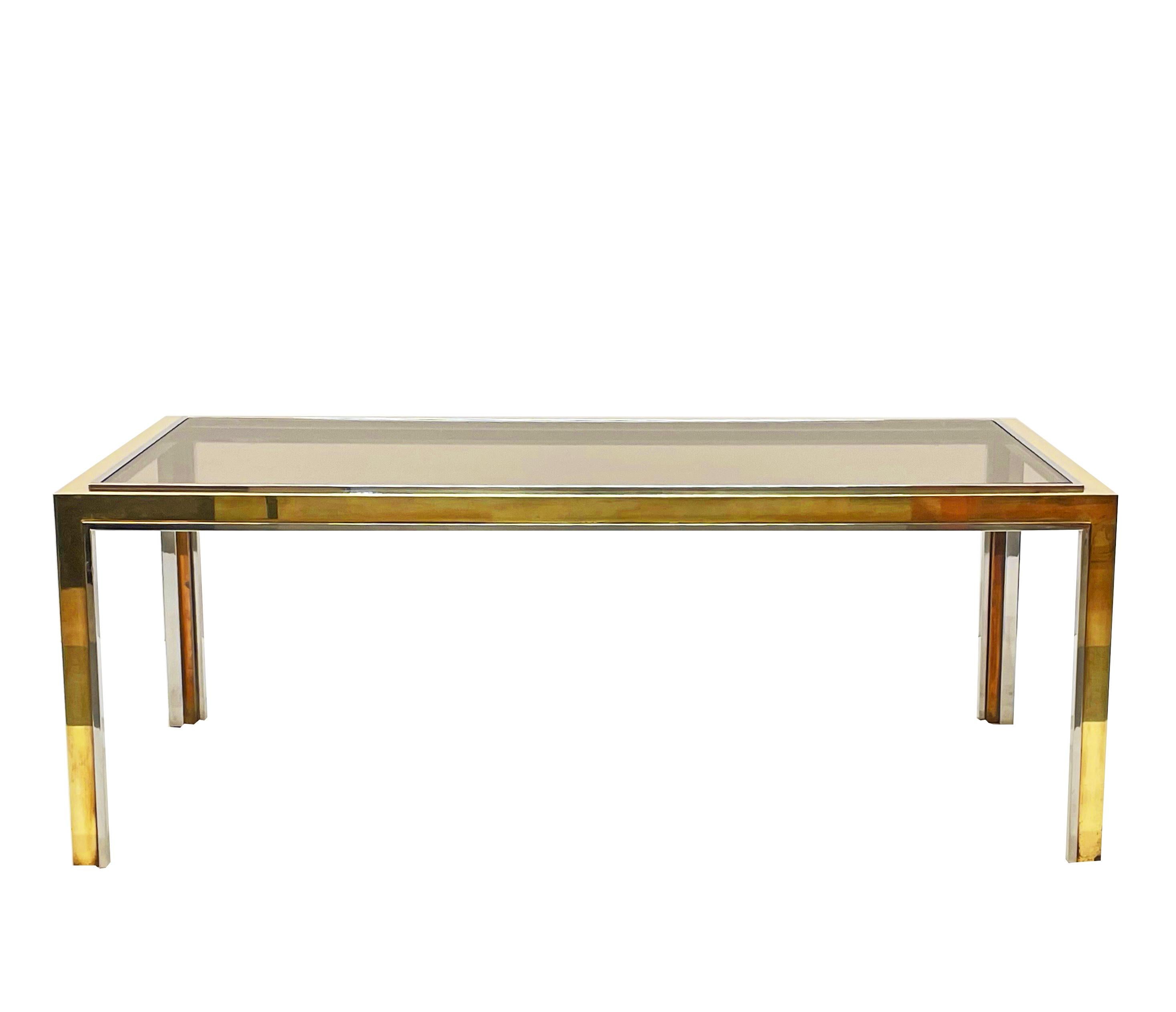 This midcentury iconic coffee table was designed in the style of Romeo Rega, one of the best 1970s-era Italian designers, well-known for the combination of modernism and glamour in his furniture creations.

Like most of Rega's production, this