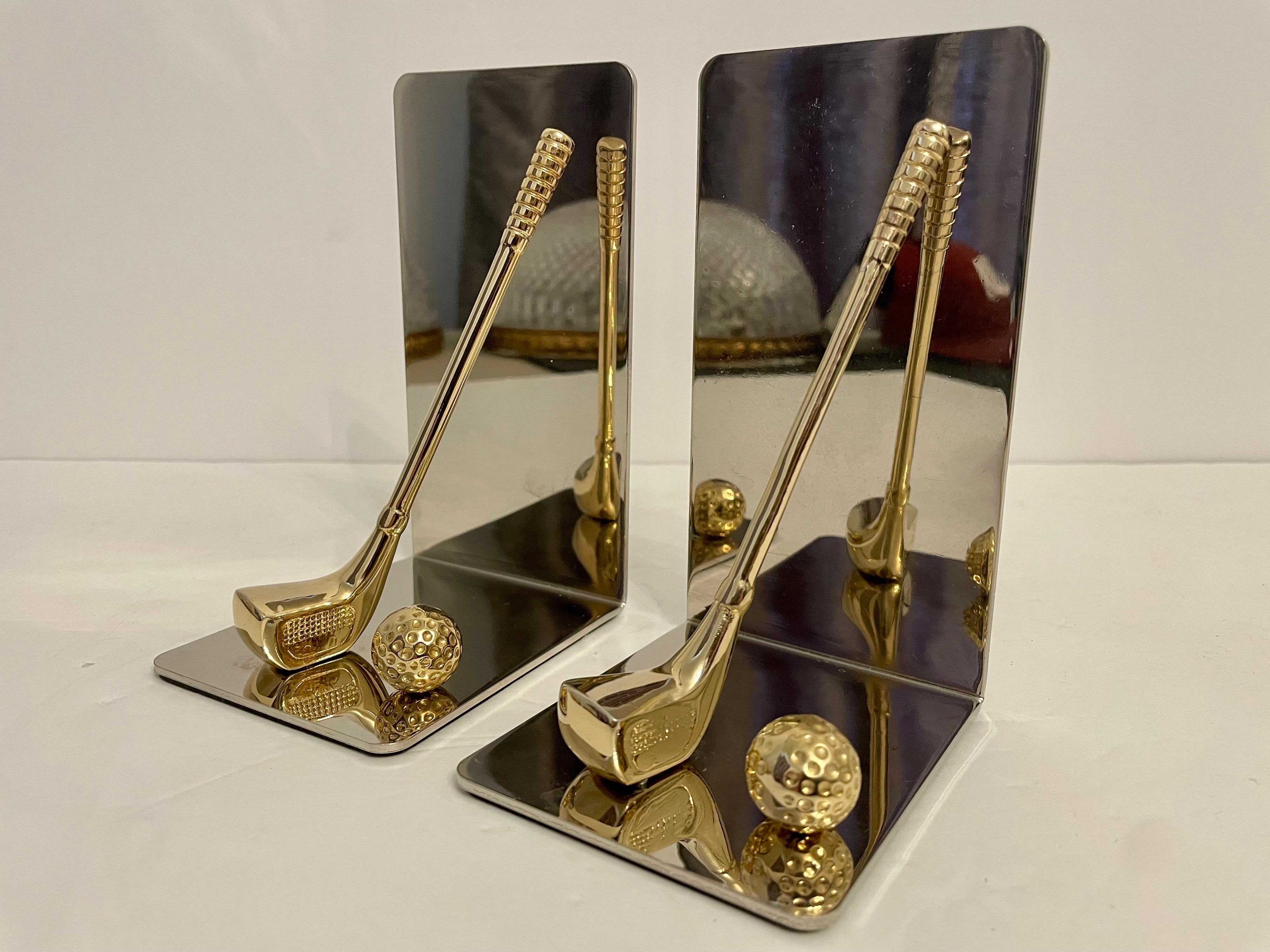 Set of brass and chrome golf bookends featuring brass club and ball with nice detail. Thin foam on bottom to prevent scratching. Great for the golfer or man cave. Good overall condition.