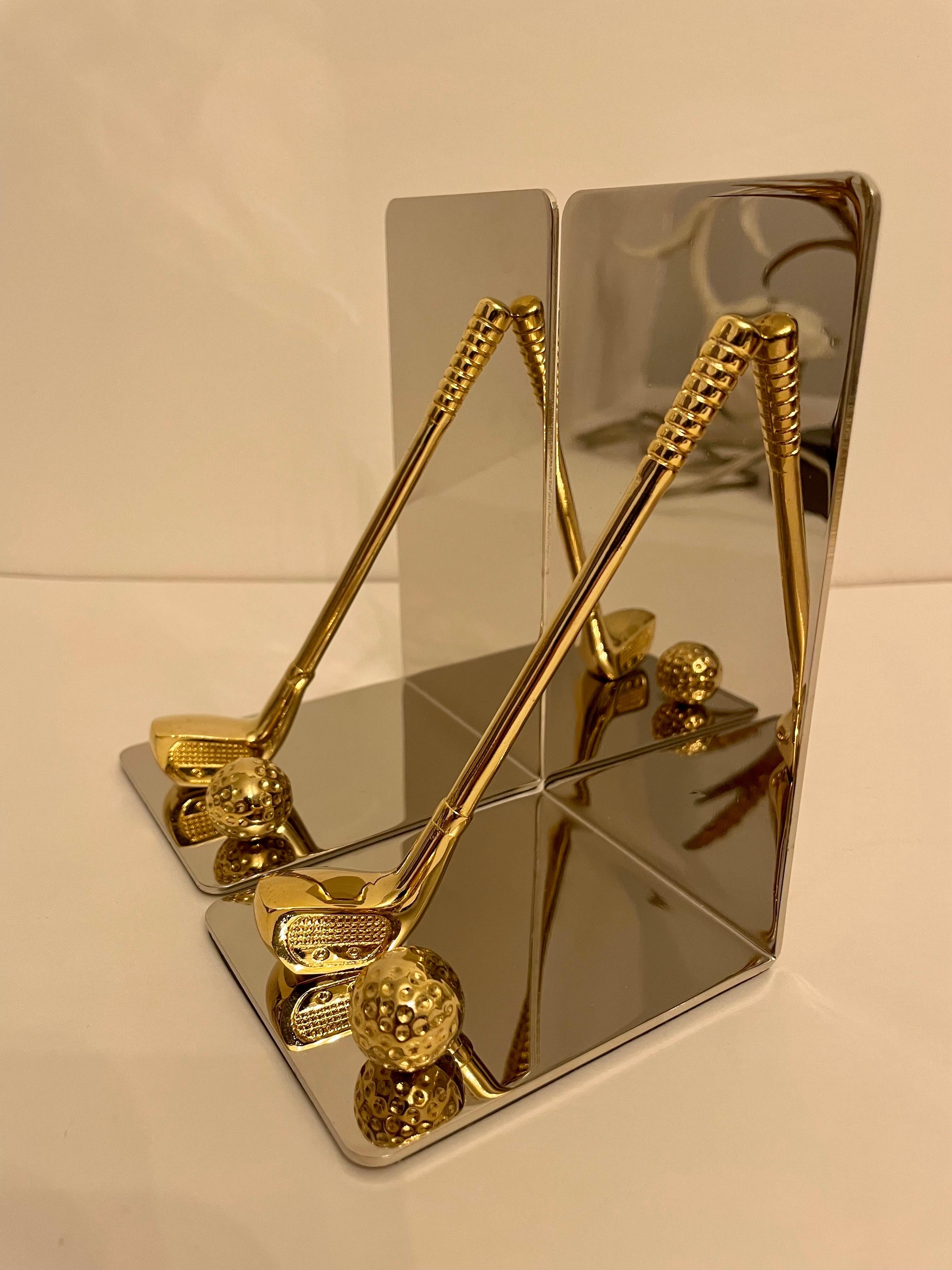 Set of brass and chrome golf bookends featuring brass club and ball with nice detail. Thin foam on bottom to prevent scratching. Great for the golfer or man cave or she shed. Great overall condition, never used.