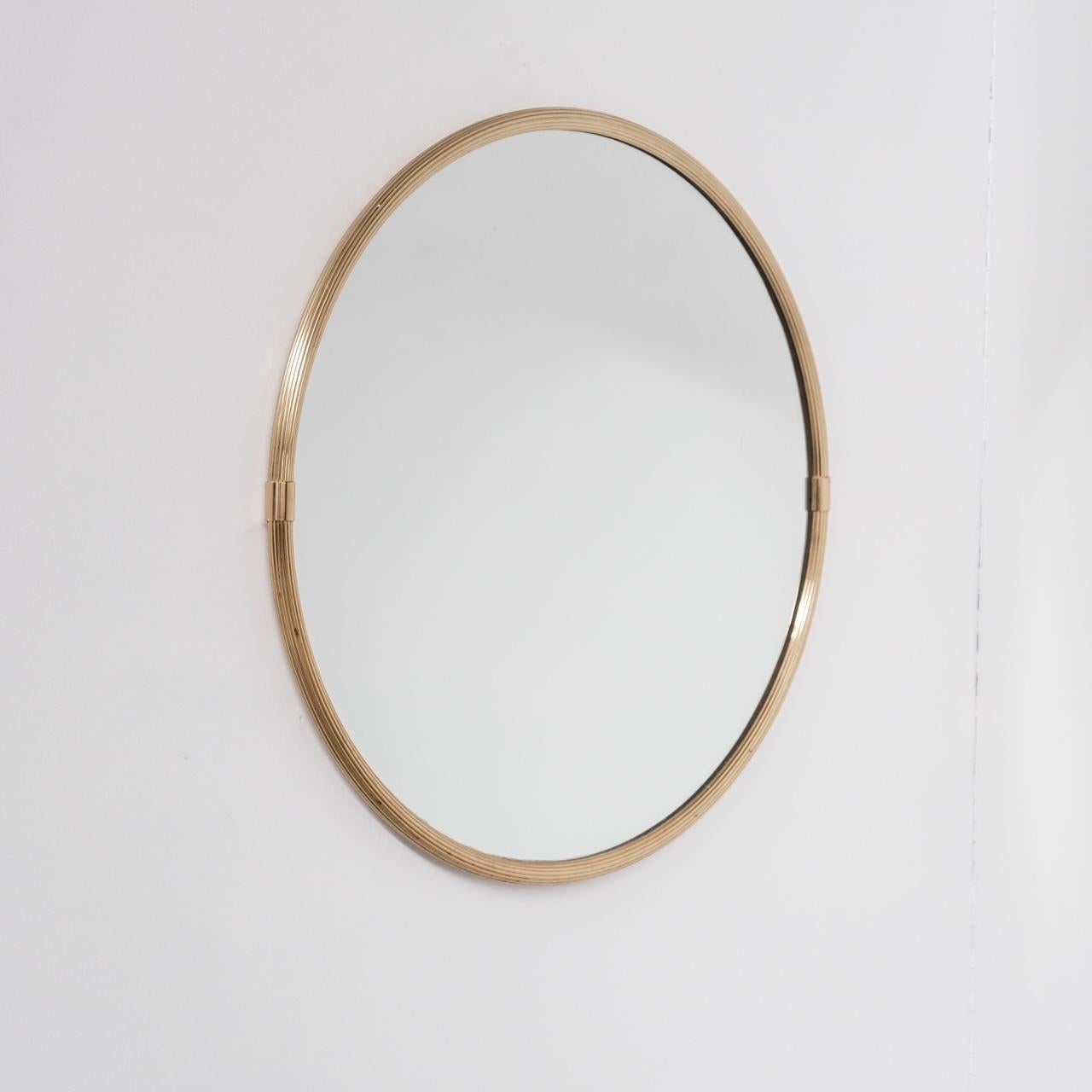 A brass Scandinavian circular mirror.

Denmark, c1960s.

Good condition, some scuffs and light surface scratches commensurate with age.

Location: Belgium Gallery.

Dimensions: 2.5 D x 61 Diameter in cm.

Delivery: POA

We can ship