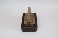 Brass Cleat mounted to Wood Base