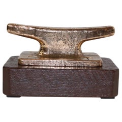 Brass Cleat mounted to Wood Base