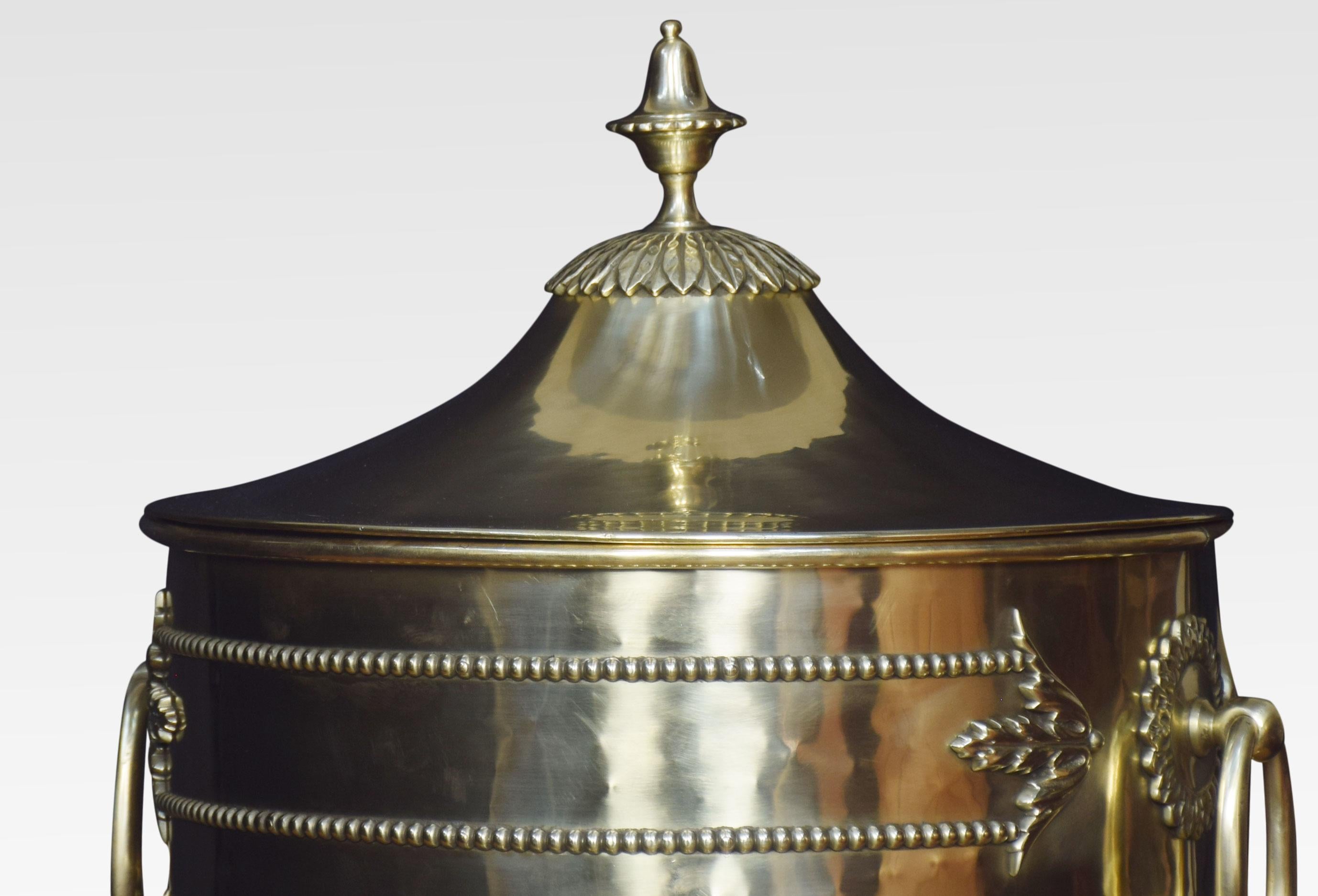 Edwardian brass urn-shaped coal vase, with cast applied decoration and ring handles, together with conforming shovel.
Dimensions
Height 23 inches
Width 11.5 inches
Depth 11.5 inches.