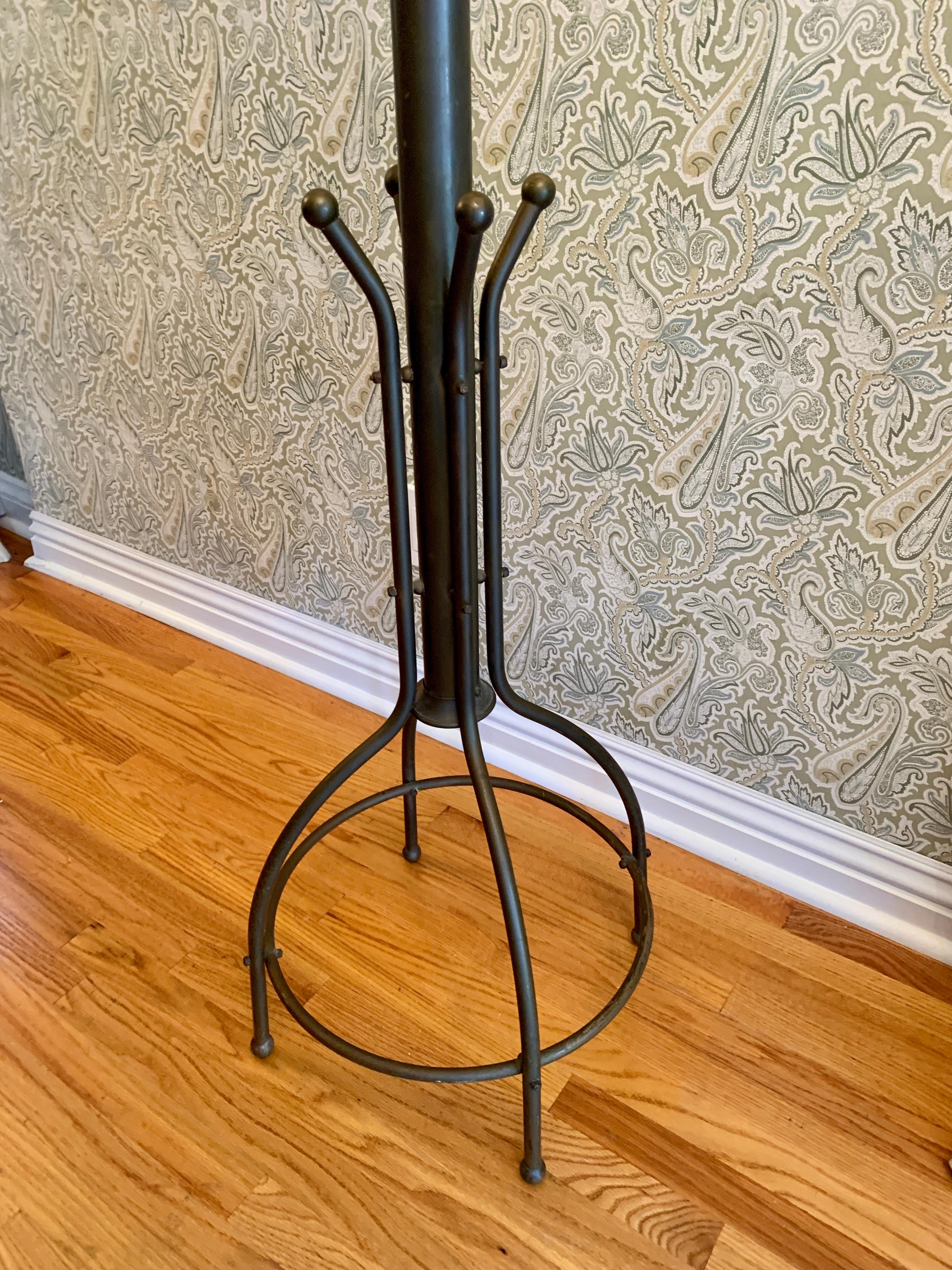 A beautifully made and patinated coat rack or hall tree with enough hooks for 4-8 coats and additional four for hats and scarves. Very good condition.

We have left the wonderful patina, which truly is very consistent and impossible to achieve