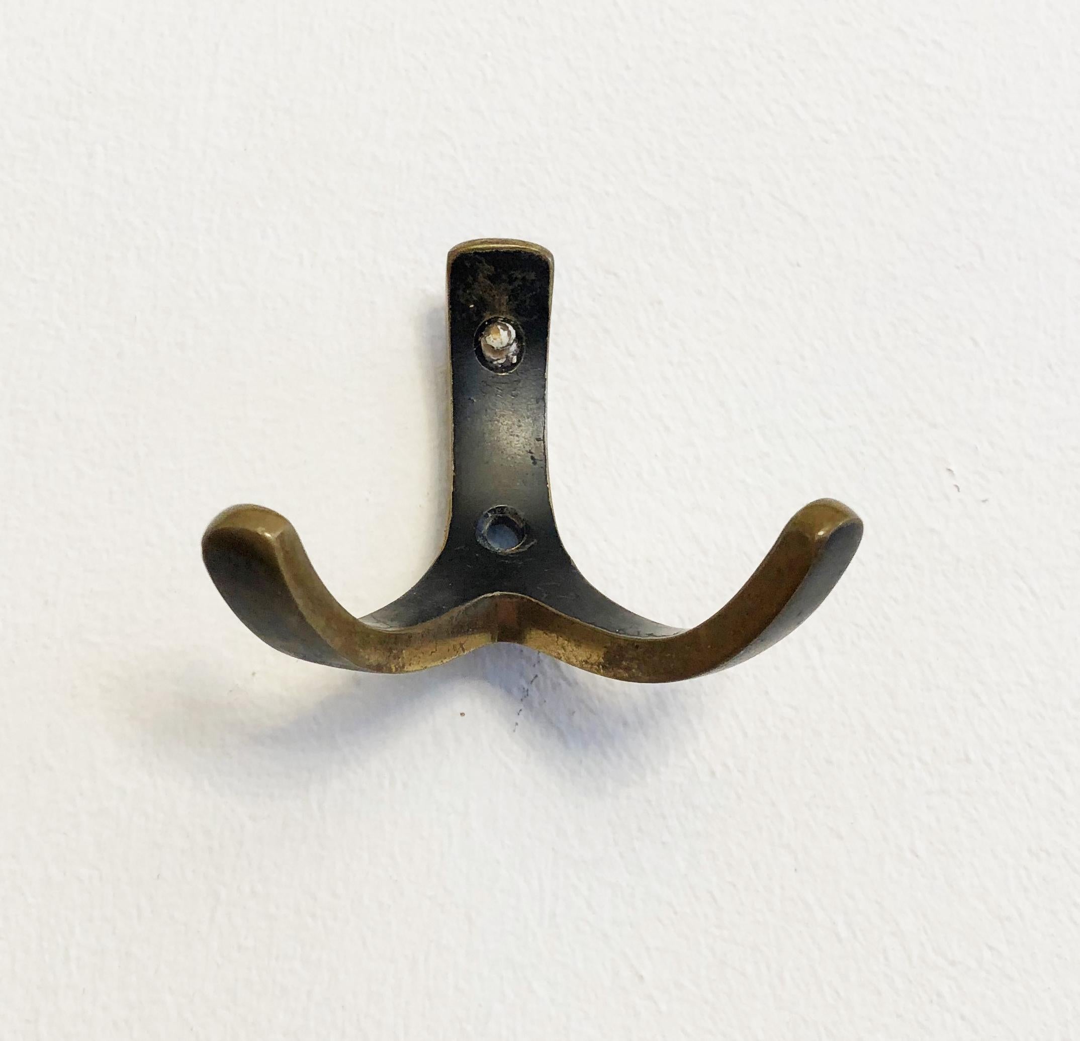 Beautiful Austrian brass hooks manufactured by Hertha Baller in Austria in the 1950s.
Up to 6 available.
