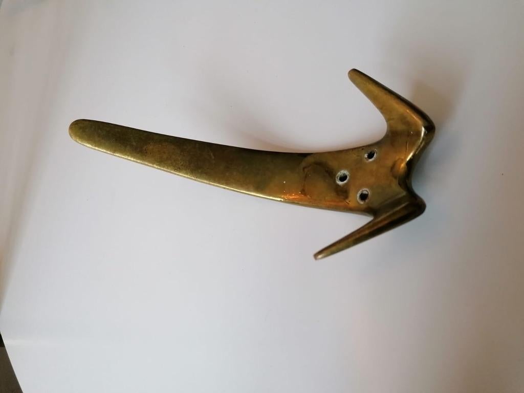 Brass hooks manufactured by Carl Auböck in Austria in the 1950s.
  