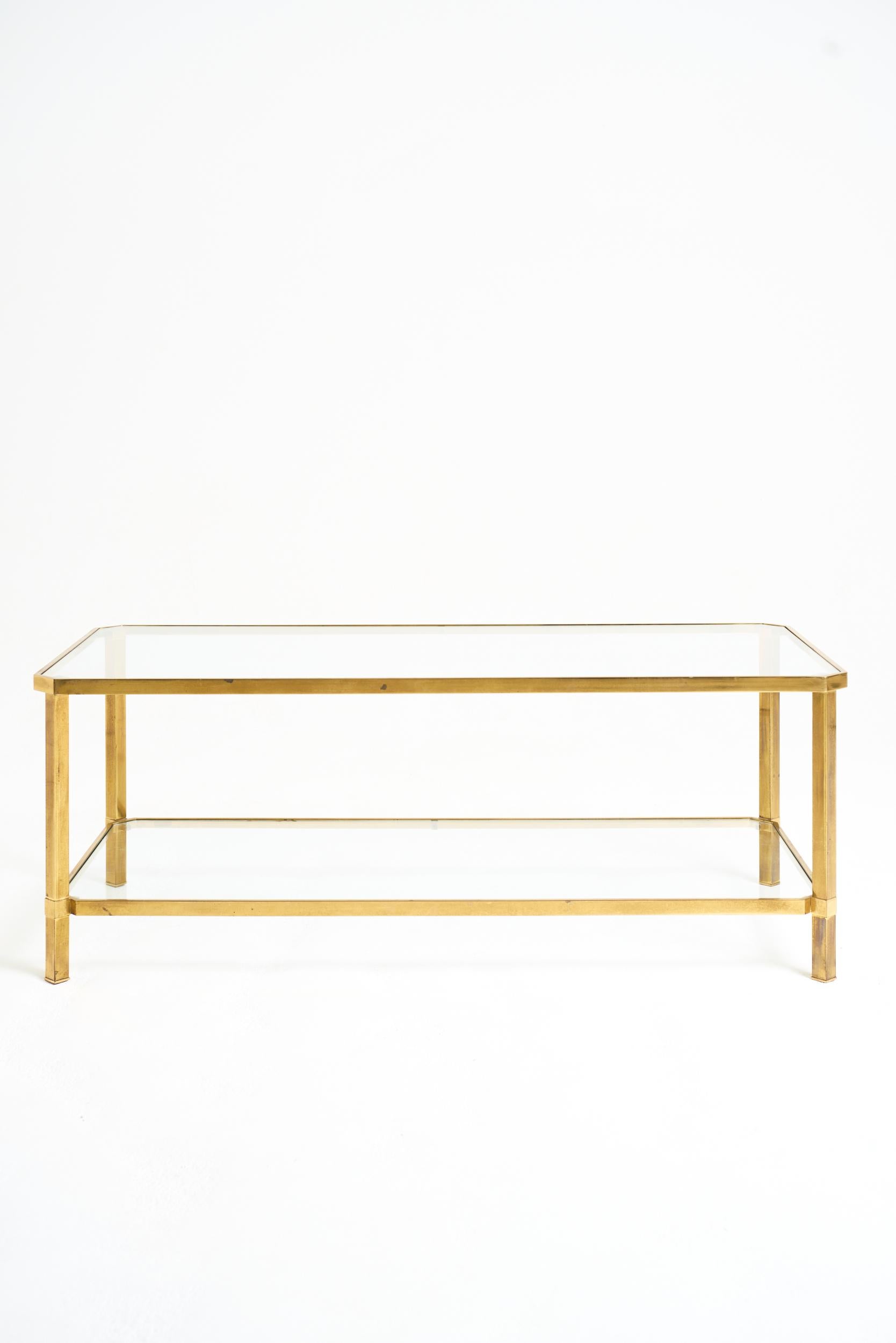 A brass and glass two-tier coffee table, with canted corners
Italy, mid 20th Century
