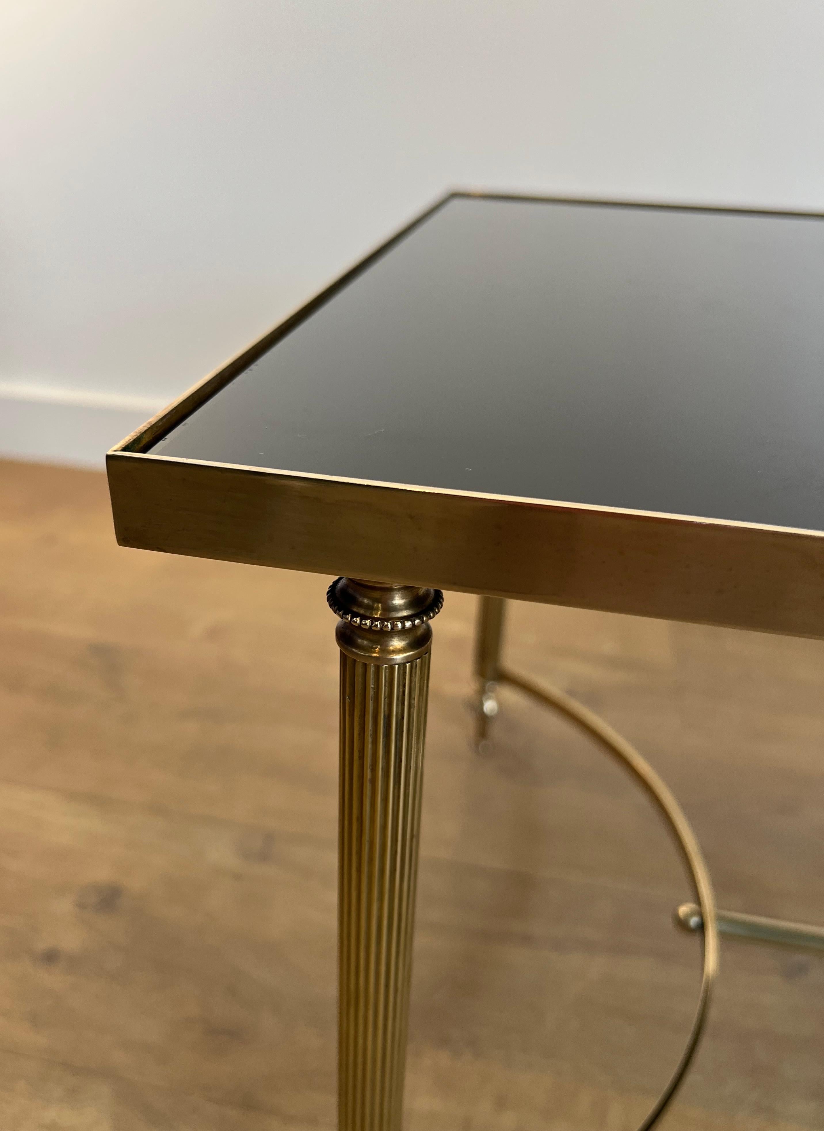 Laiton Table basse en laiton avec plateau en verre laqué noir par Maison Jansen en vente