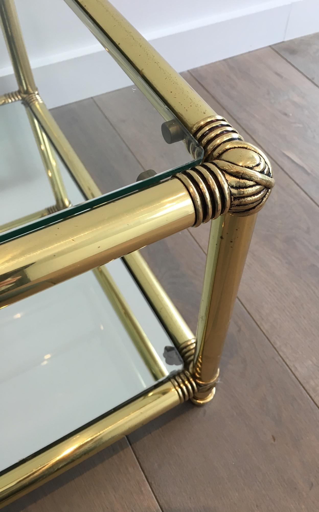 French Brass Coffee Table with Brass Noodles on Corners, Clear Glass Shelf on Top and