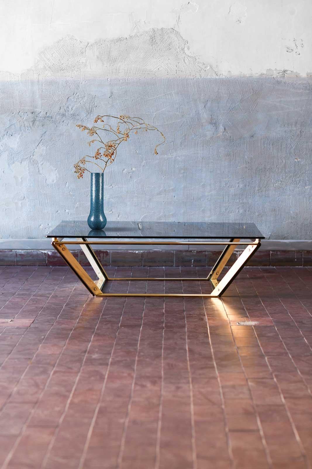 Brass coffee table with glass top, Italy 1970
Product details
Dimensions 110 W x 34 H x 110 D cm