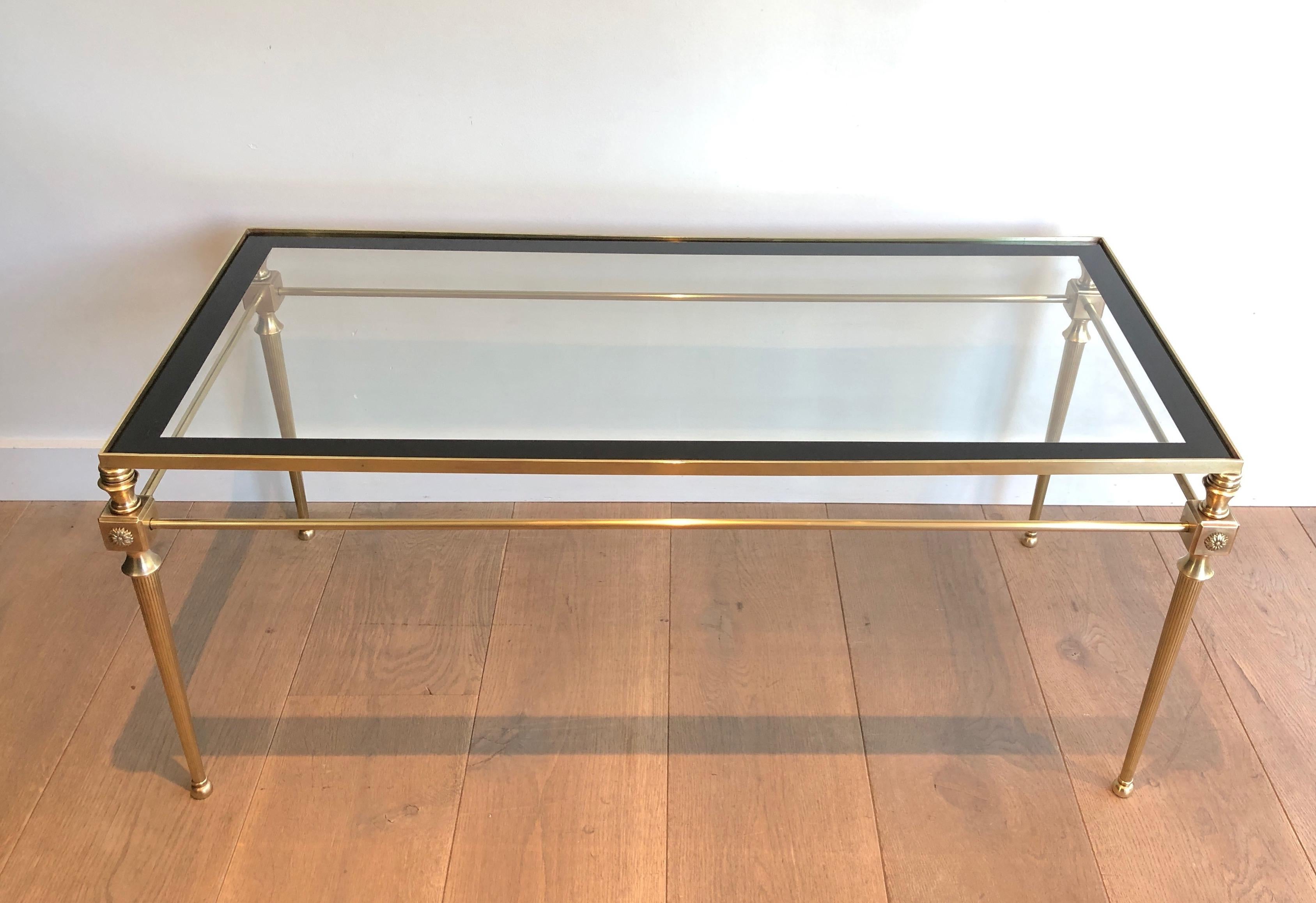 Neoclassical Brass Coffee Table with Glass Top Surrounded by Black Lacquered Line For Sale