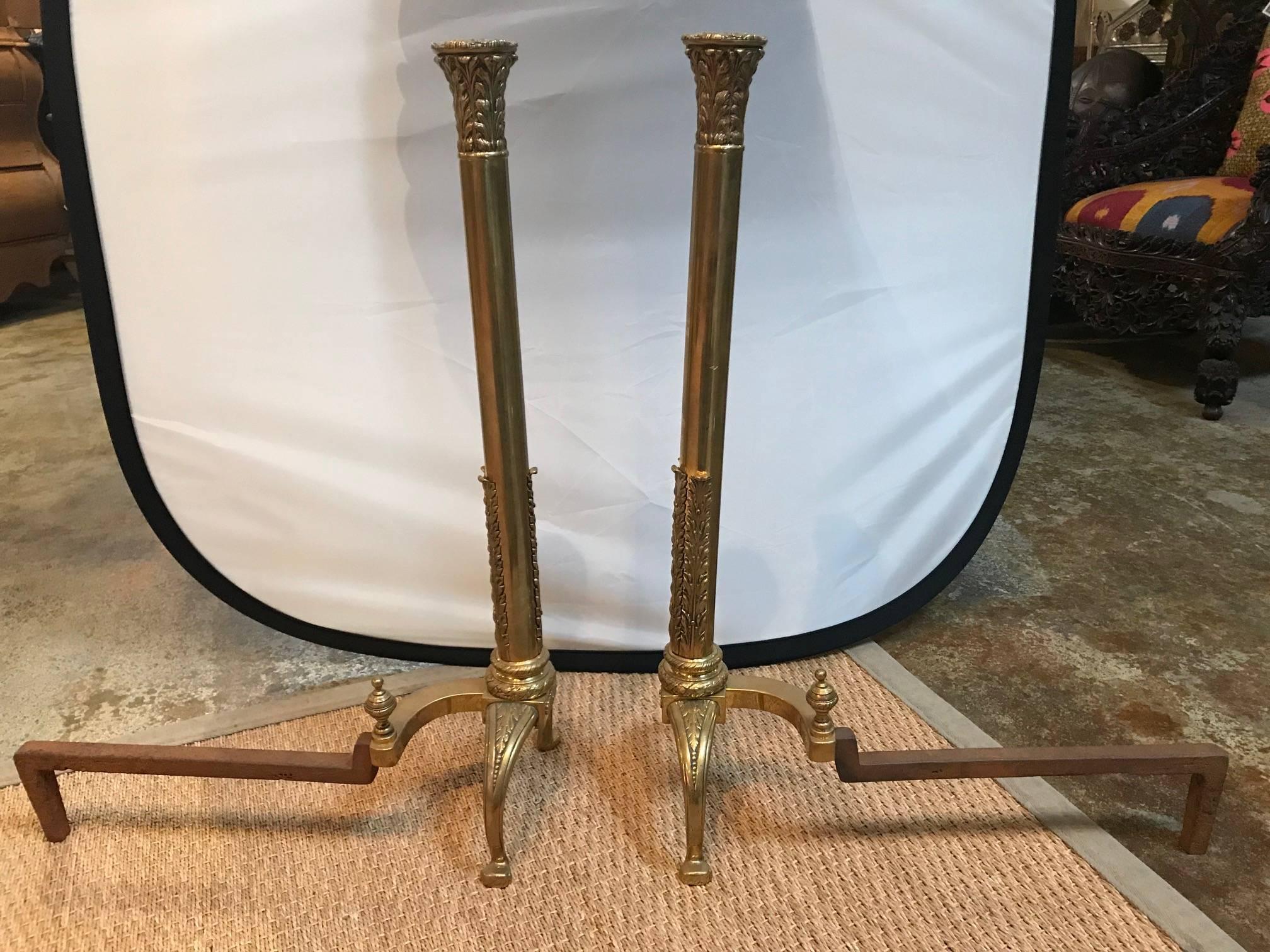 Classical brass column andirons.