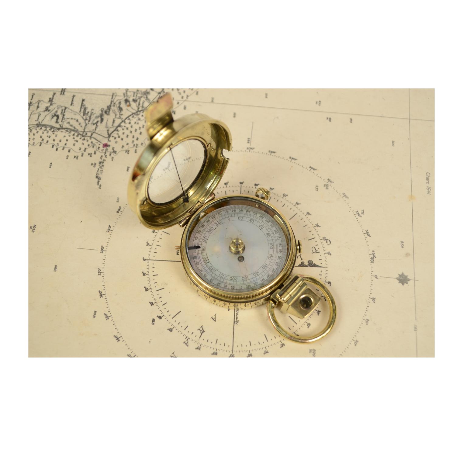 Prismatic bearing compass made of brass; it is a small compass, Verner’s Pattern model named after the designer, Colonel William Willoughby Cole Verner (1852-1922) and produced in 1918 and supplied to British officers, typically used in navigation.