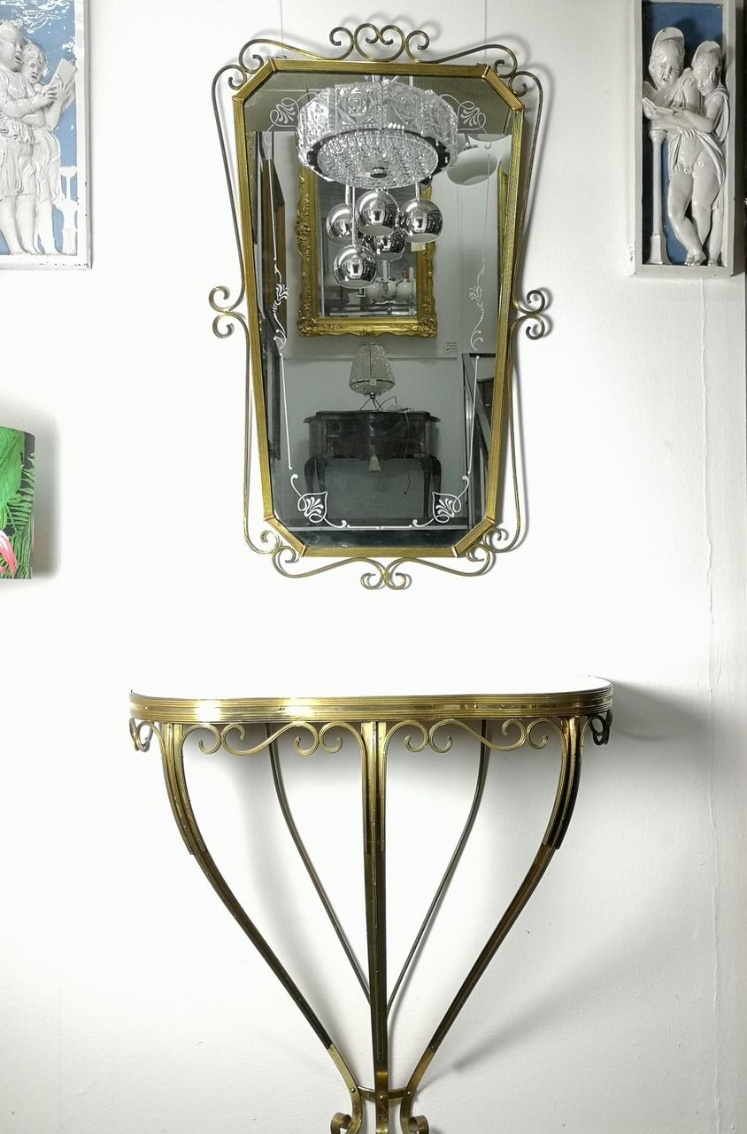 Brass console table with chiseled wall mirror, 1970s.