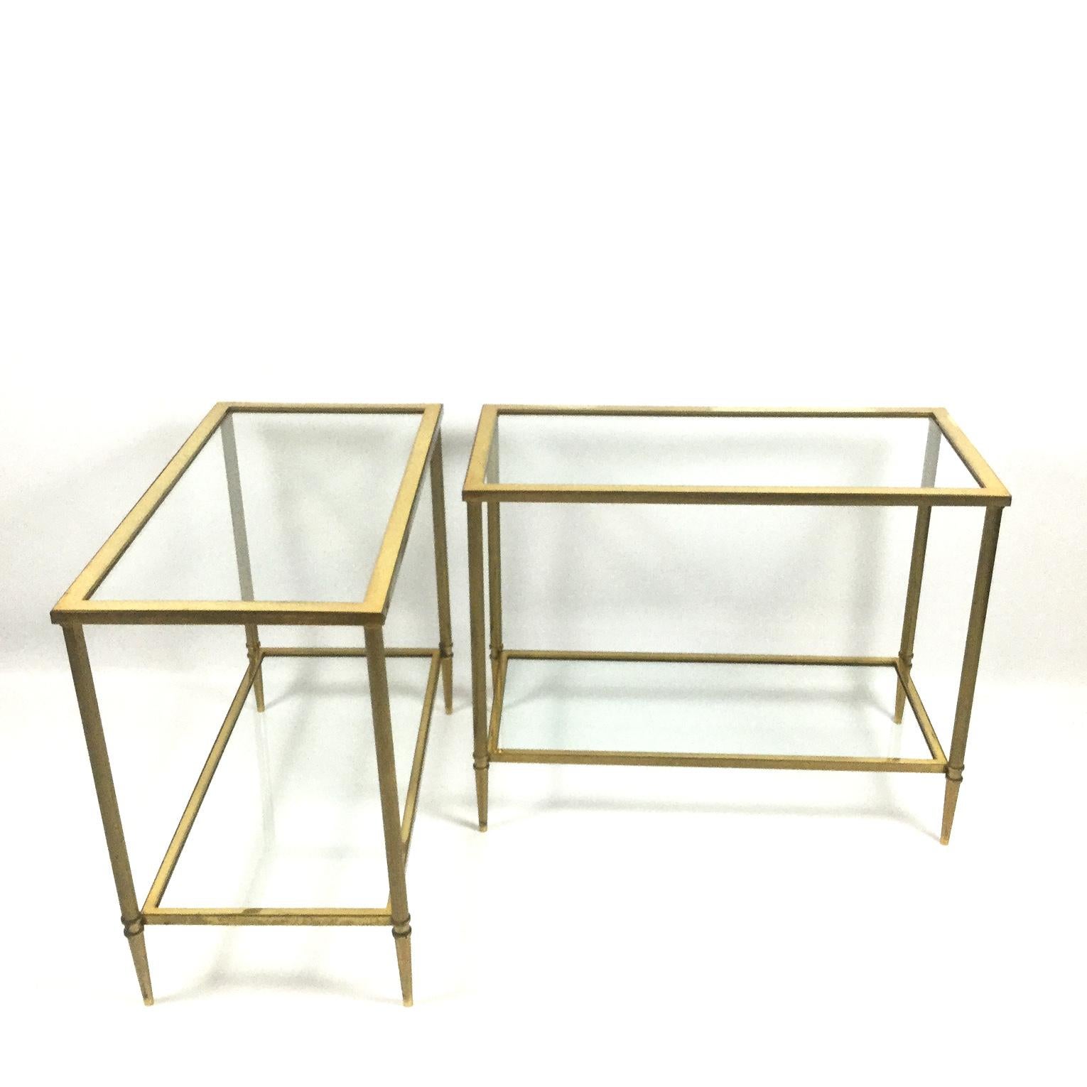 Pair of brass quality console tables with his own original glass shelves
Attributed to Maison Jansen.