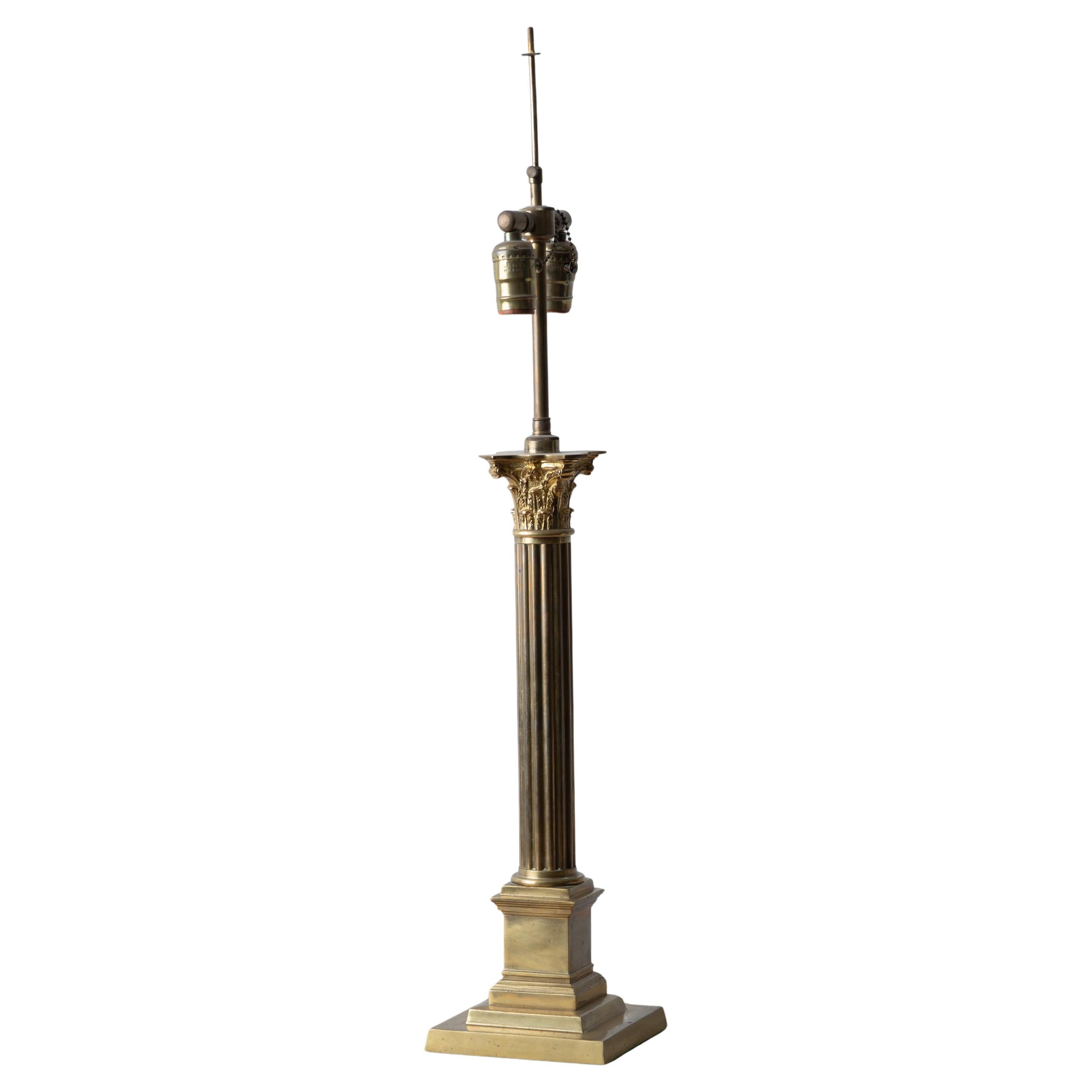 A brass corinthian column lamp, 19th century.

Electrified and sold by Sentimento Antiques.



6 inches wide by 6 inches deep by 32 inches tall;

18 ½ inches to top of column




