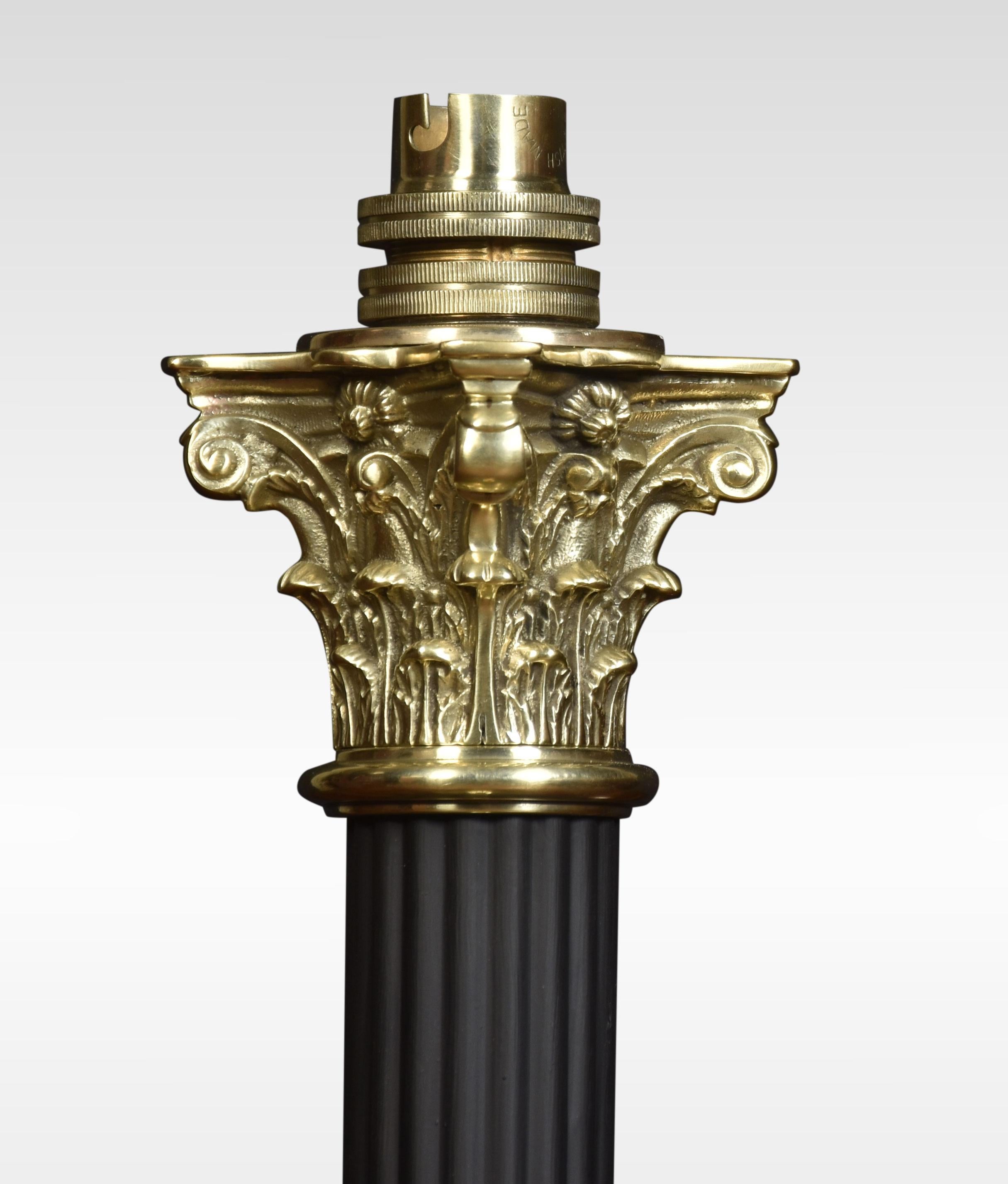 Brass table lamp, having a Corinthian column on a stepped square base. The lamp has been rewired.
Dimensions
Height 17 Inches
Width 5.5 Inches
Depth 5.5 Inches.