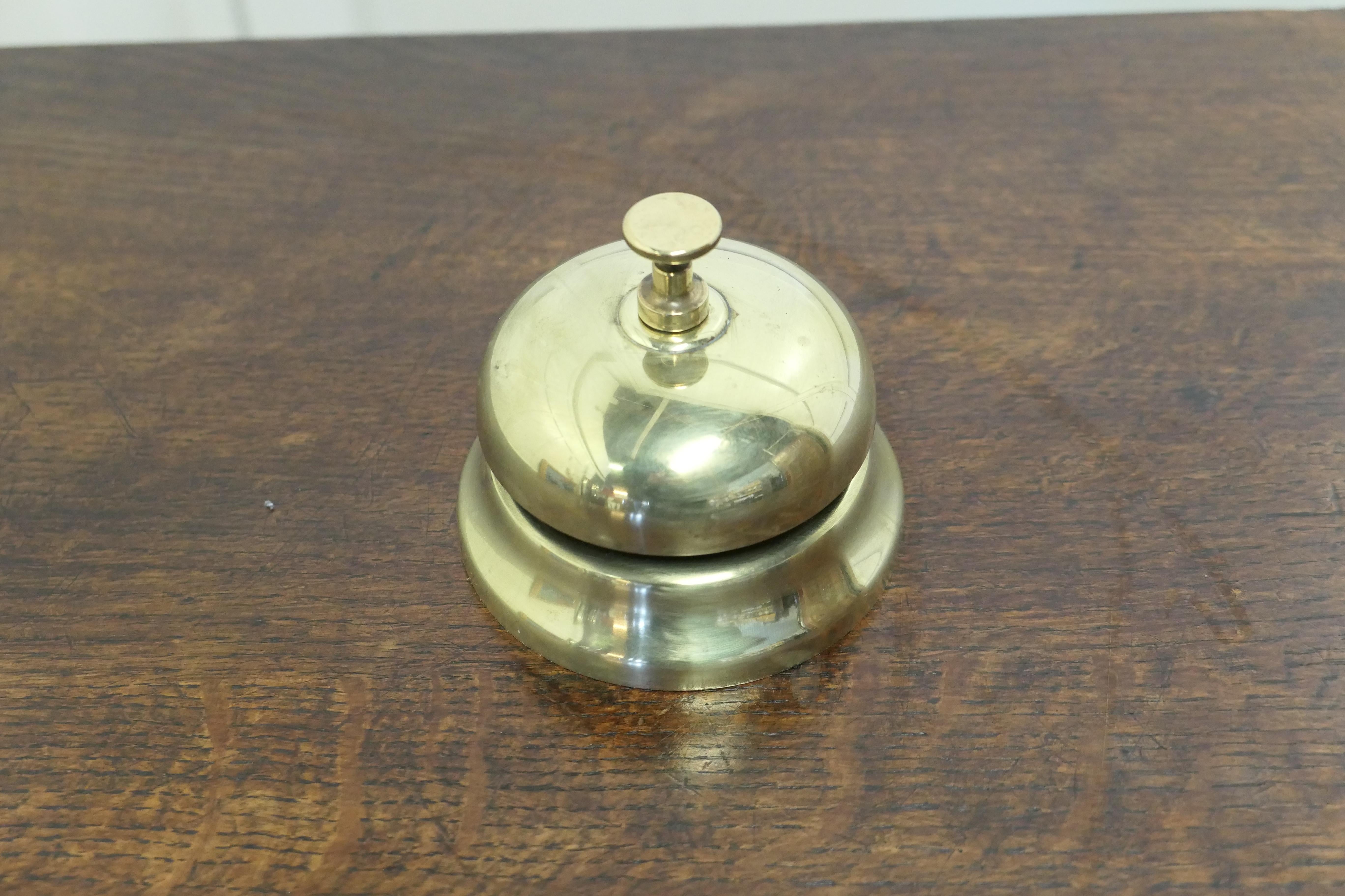 Brass Courtesy counter top bell, reception desk bell

Made in solid brass, in good condition and ready to use with a demanding ding, the bell is 4” in diameter and 4” high 
TCC46.