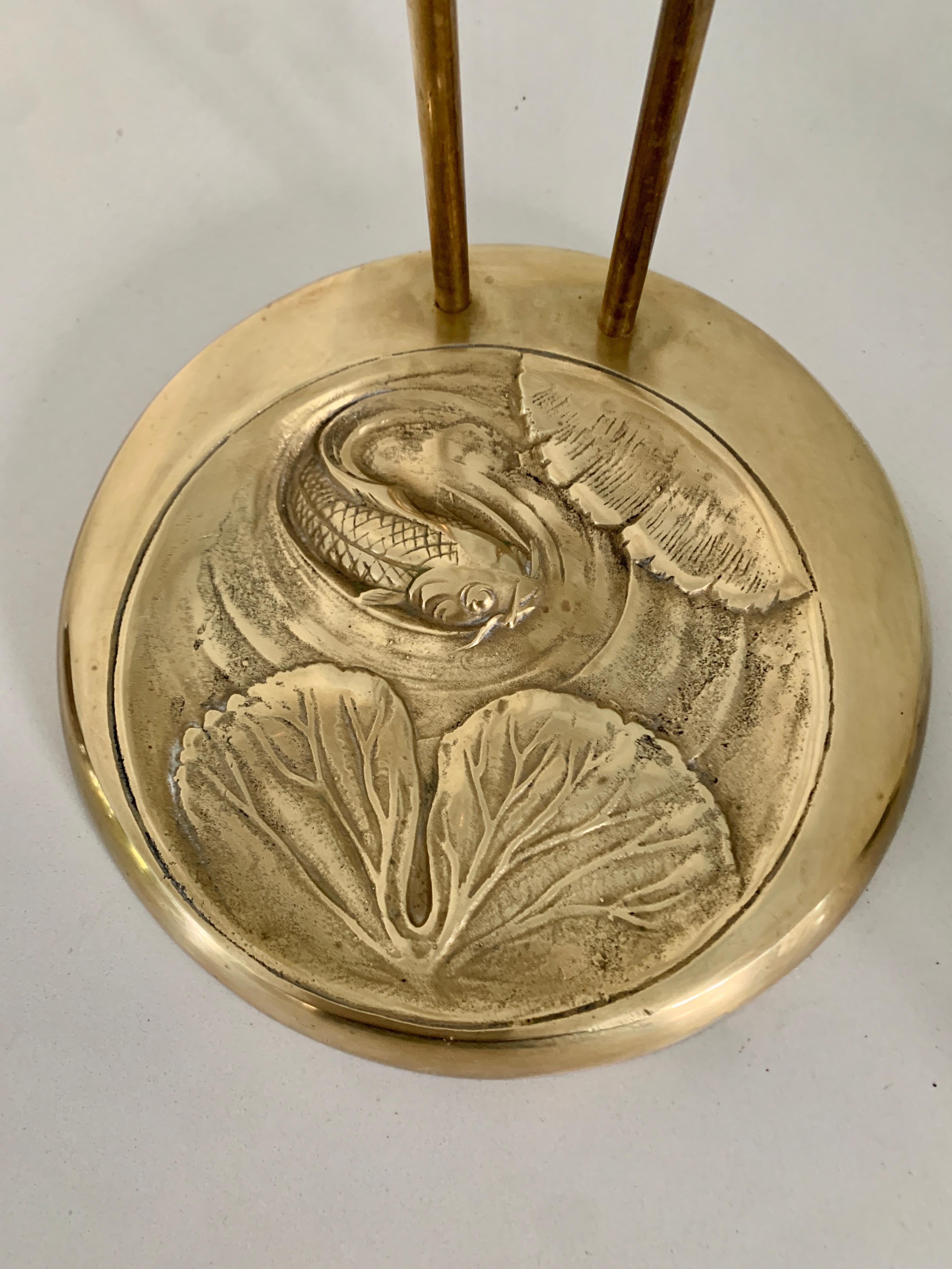 A wonderful and gracefully designed Brass Umbrella Stand in the shape of an arched Crane. The piece has a drip pan with a creative repousse swirl of water and Koi. A compliant to any entry or commercial space.
housewarming gift, Birthday gift.