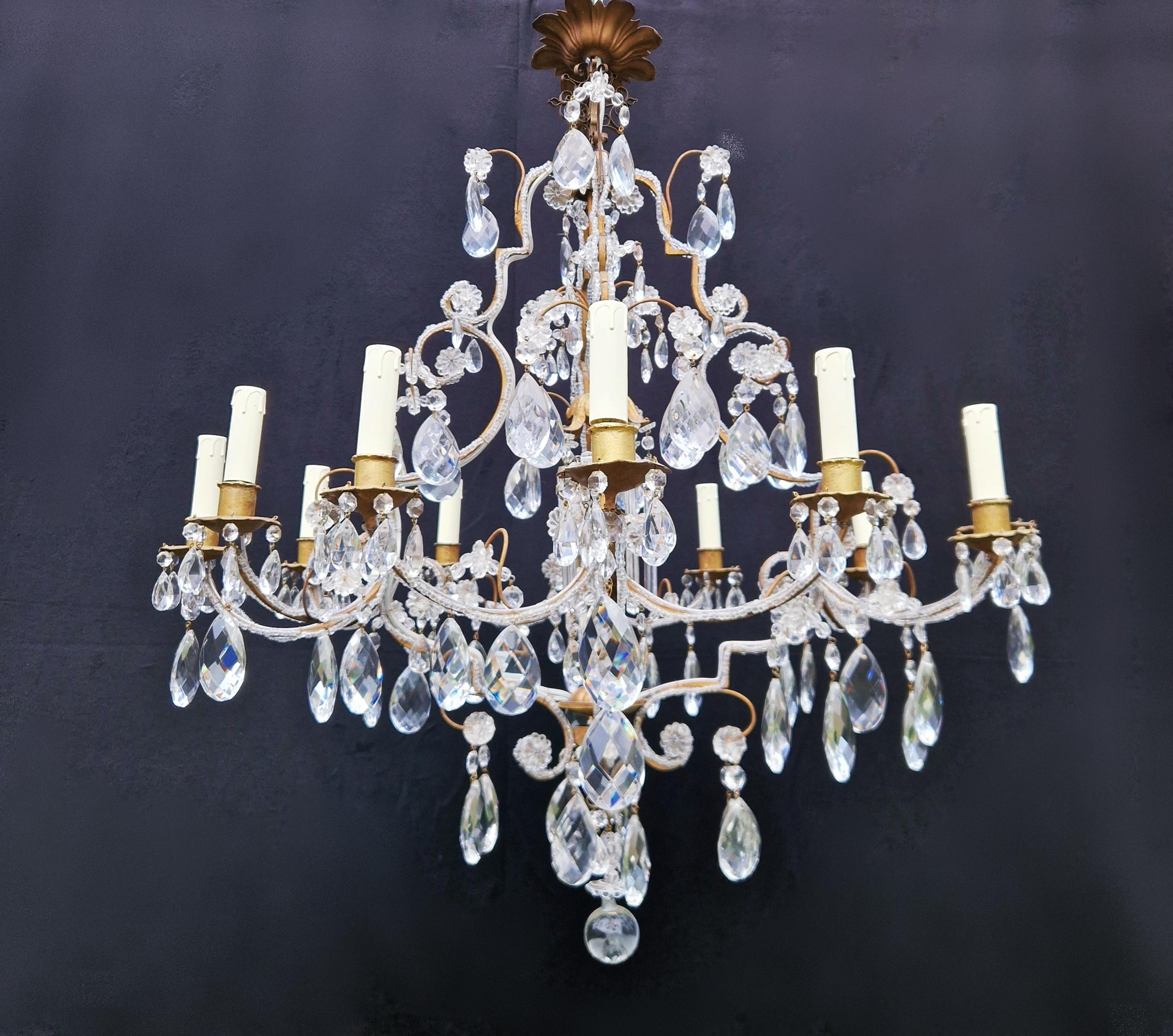 Introducing our treasured old chandelier, lovingly and professionally restored in Berlin. Its electrical wiring is compatible with the US, having been re-wired and prepared for easy hanging. With not a single crystal missing, the cabling has been