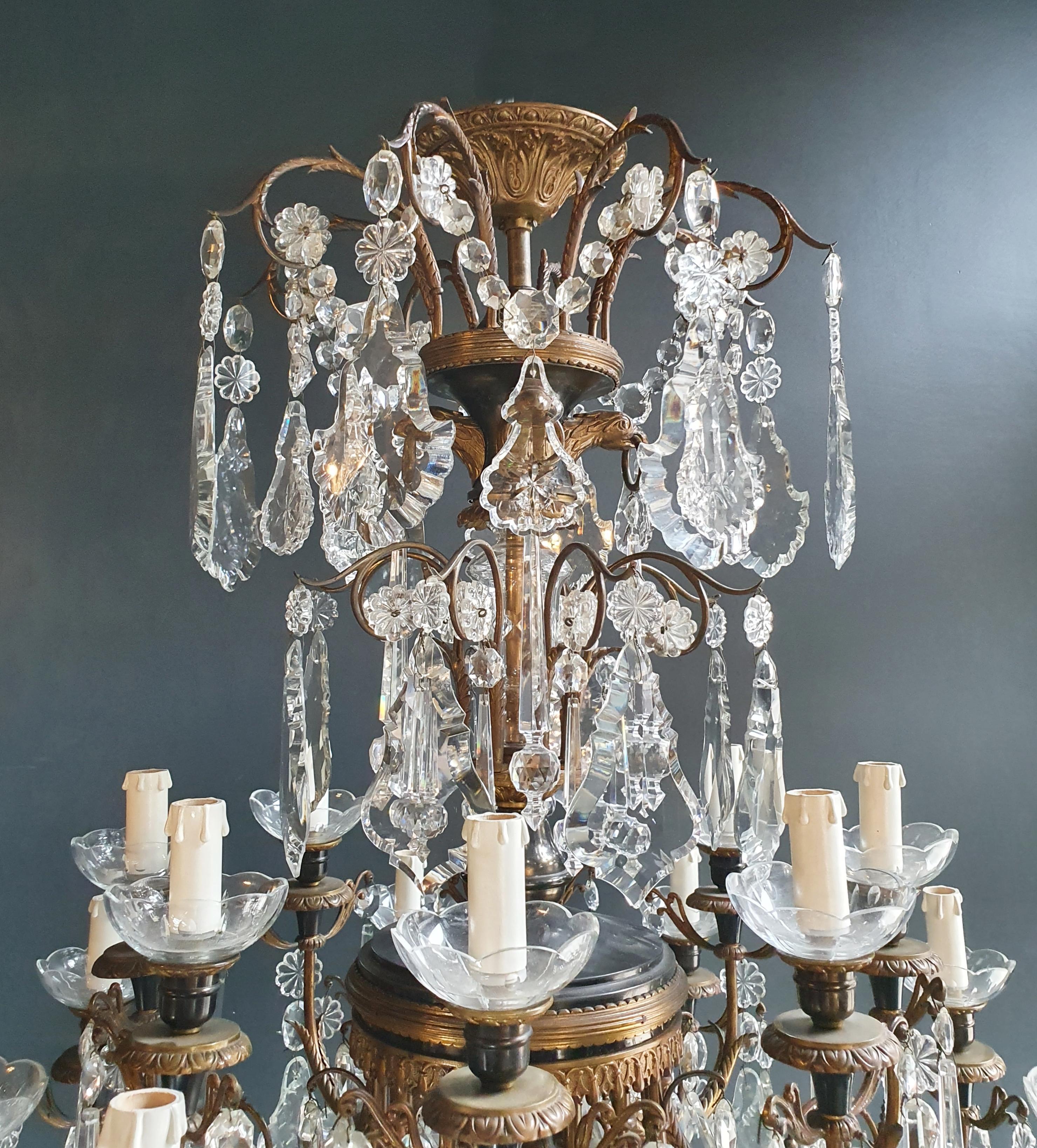 Brass crystal chandelier antique ceiling lamp lustre Art Nouveau lamp

Measures: Total height 130 cm, height without chain 90 cm, diameter 76 cm. Weight (approximately) 25 kg.

Number of lights: 16-light bulb sockets: E14
Material: Brass,