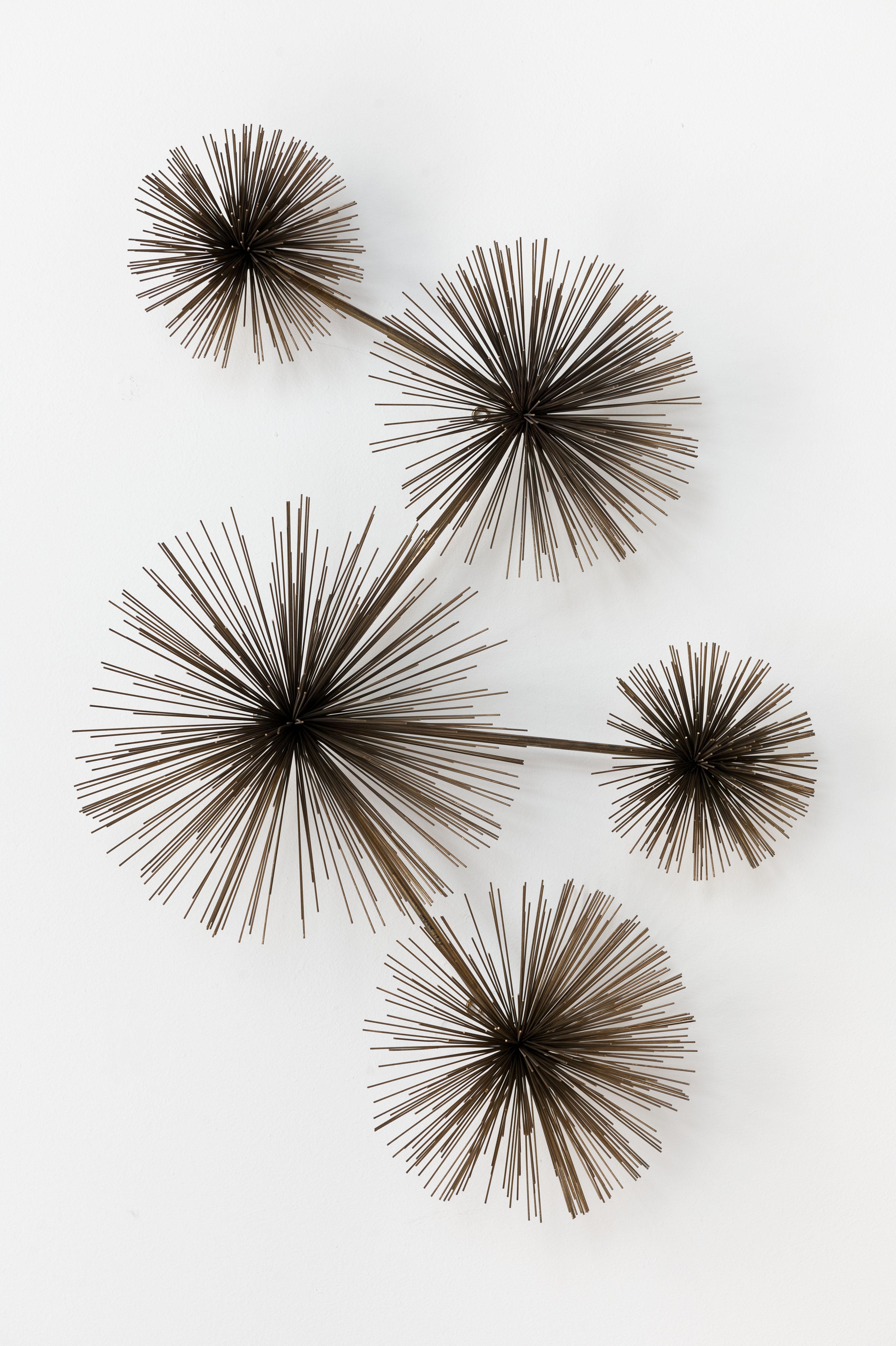 Vintage iconic C. Jere metal 'Pom Pom' or 'Sea Urchin' wall sculpture by Artisan House executed in brass. 
Sculpture can hang by one to three hooks in horizontal or vertical. 
Object is fully signed and dated, 'C Jere 1979', see last image.