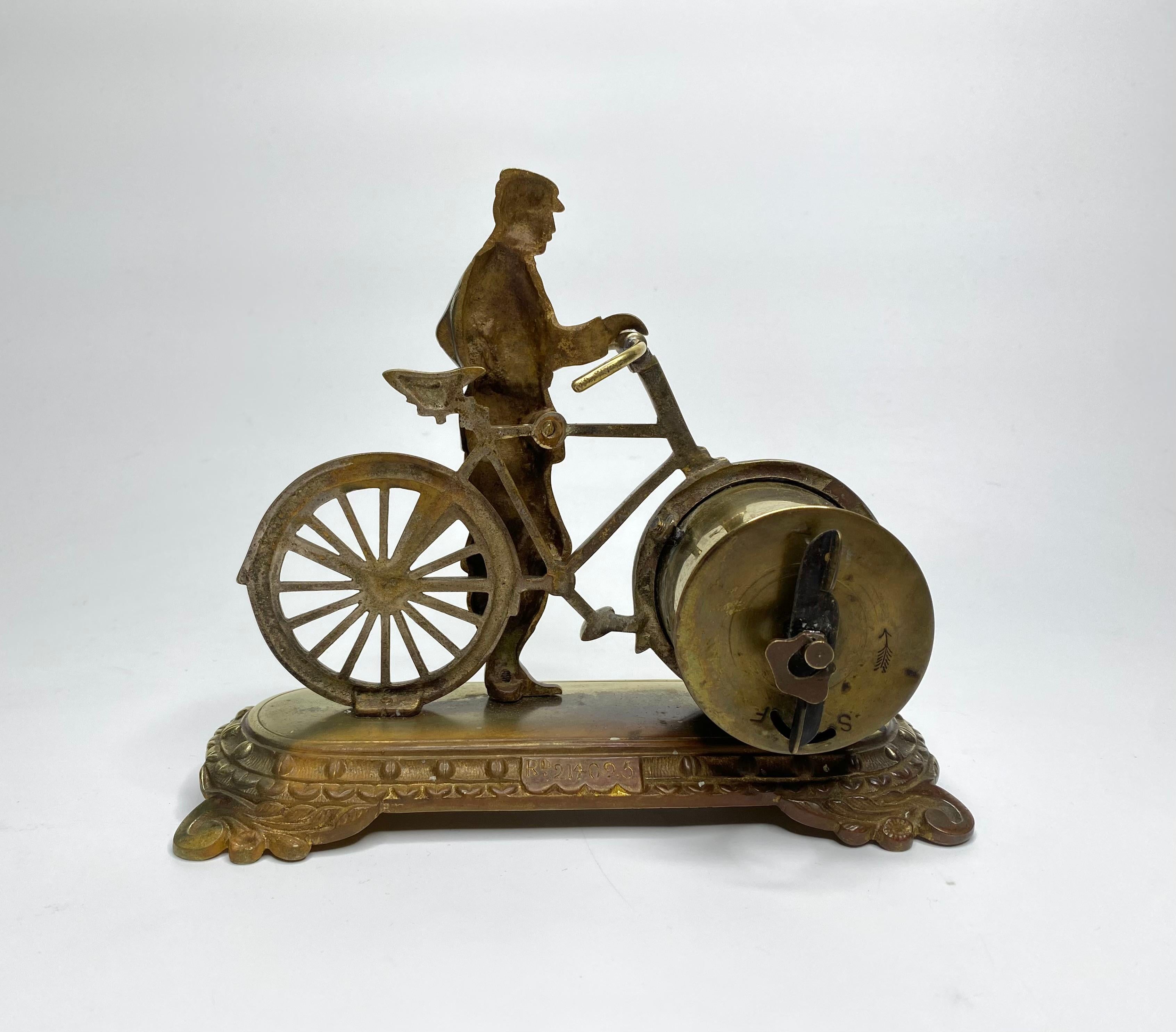 Edwardian Brass cyclist and bicycle clock, England, c. 1910.