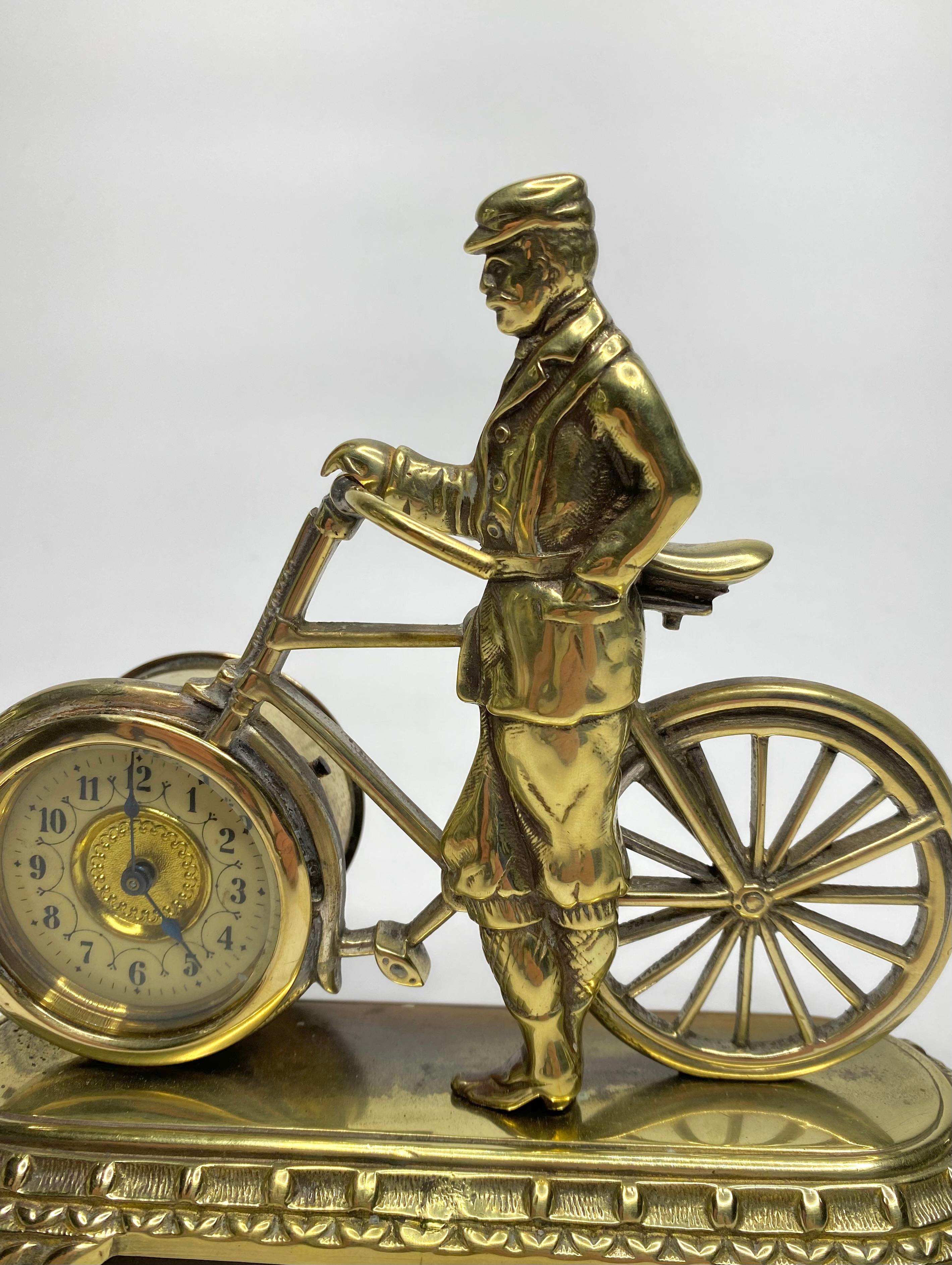 Brass cyclist and bicycle clock, England, c. 1910. In Excellent Condition In Gargrave, North Yorkshire
